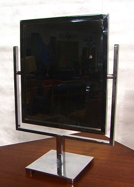 Chrome Store Display Mirror on Stand. Double Side: Chrome Store Display Mirror on Stand. Double Sided mirror.-- Dimensions: H: 17.5 inches: W: 12.75 inches: D: 6 inches ---