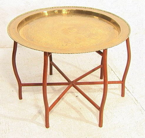 Decorator Brass and Wood Cocktail Table. Large e: Decorator Brass and Wood Cocktail Table. Large engraved brass tray on folding wood base. Asian influence.-- Dimensions: H: 24.5 inches: W: 36 inches ---