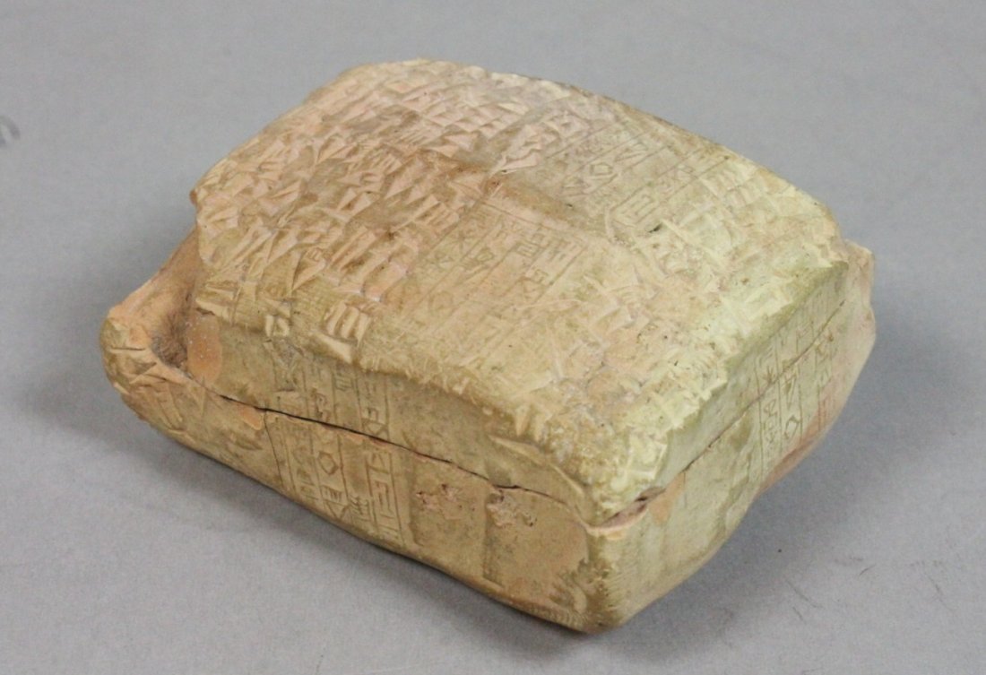 Sumerian Tax Tablet. Antique Limestone.: Sumerian Tax Tablet. Antique Limestone.-- Dimensions: H: 1.5 inches: W: 2.75 inches --- US Shipping charge: $14