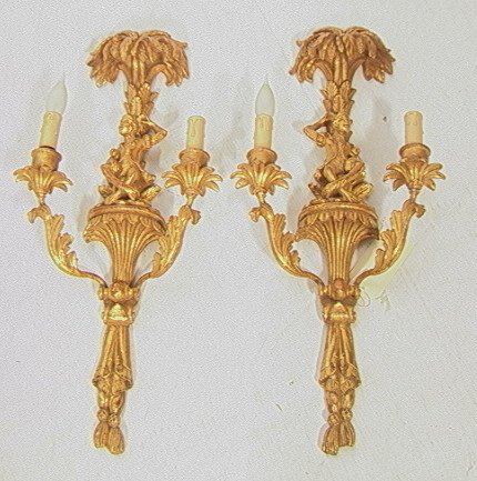 Pair Gilt Carved Wood Monkey Wall Sconces. Doubl: Pair Gilt Carved Wood Monkey Wall Sconces. Double arm. Made in Italy.-- Dimensions: H: 27 inches: W: 12 inches: D: 6.5 inches ---