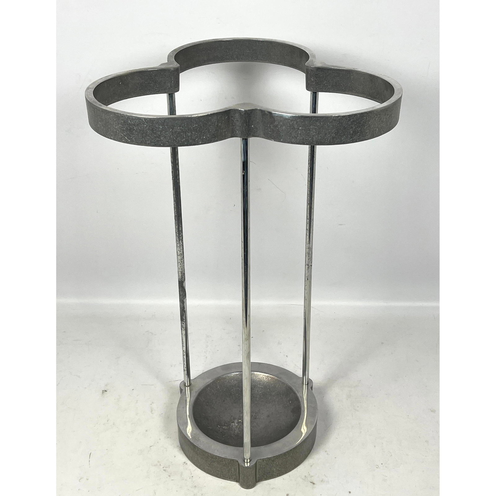 CE Magnusson for EFM aluminum umbrella stand: CE Magnusson for EFM aluminum umbrella stand Dimensions: Height: 19.5 inches, Width: 12.5 inches, Depth: 12 inches. --- - We offer curbside delivery for most items to NYC, Manhattan, Close Brooklyn, H