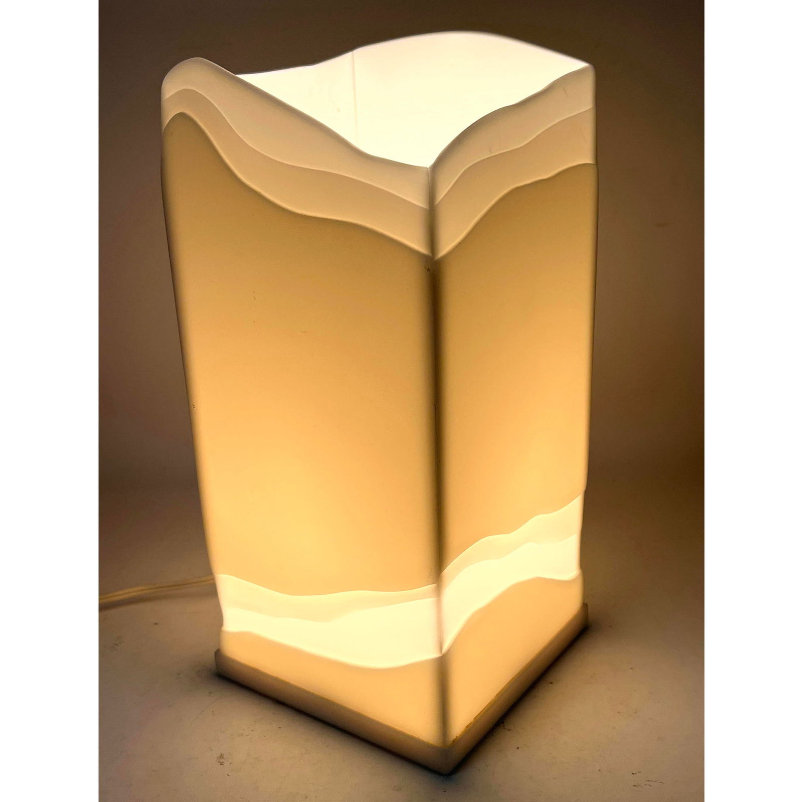 Ray Fisher Lamp. White hard plastic with interesting lit up effect. Signed.: Ray Fisher Lamp. White hard plastic with interesting lit up effect. Signed. Dimensions: Height: 12 inches, Width: 5.75 inches, Depth: 5.75 inches. --- US Packing and Shipping charge: In house shipping
