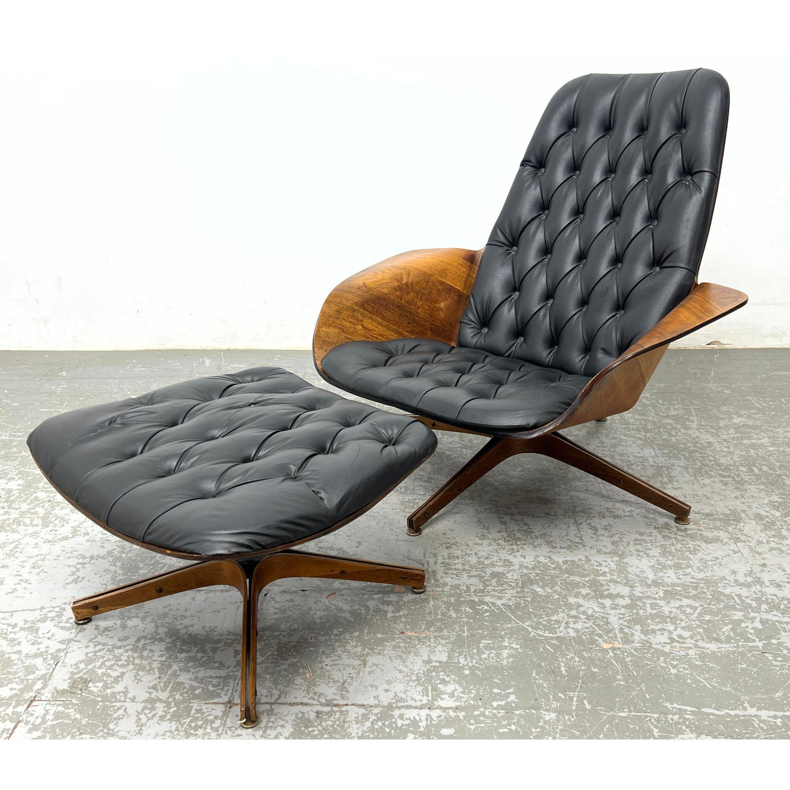 George Mulhauser Plycraft Lounge Chair and Ottoman.: George Mulhauser Plycraft Lounge Chair and Ottoman. Watch the video on our YouTube channel @uniquesitems, Copy and paste URL. https://youtube.com/watch?v=s0I38Zjxuws Dimensions: Height: 35.5 inches,