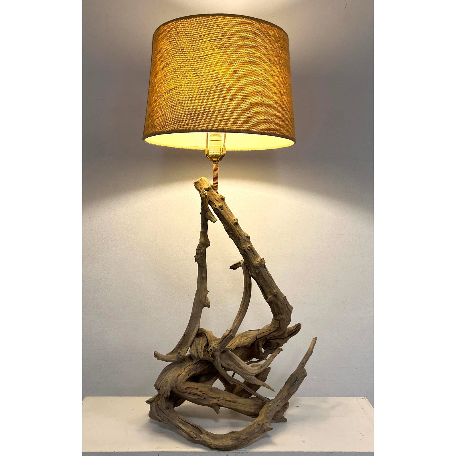 Multi branch assembled Driftwood lamp. Small Burlap shade.: Multi branch assembled Driftwood lamp. Small Burlap shade. Dimensions: Height: 39.5 inches, Width: 19 inches, Depth: 11 inches. --- - We offer curbside delivery for most items to NYC, Manhattan, Close
