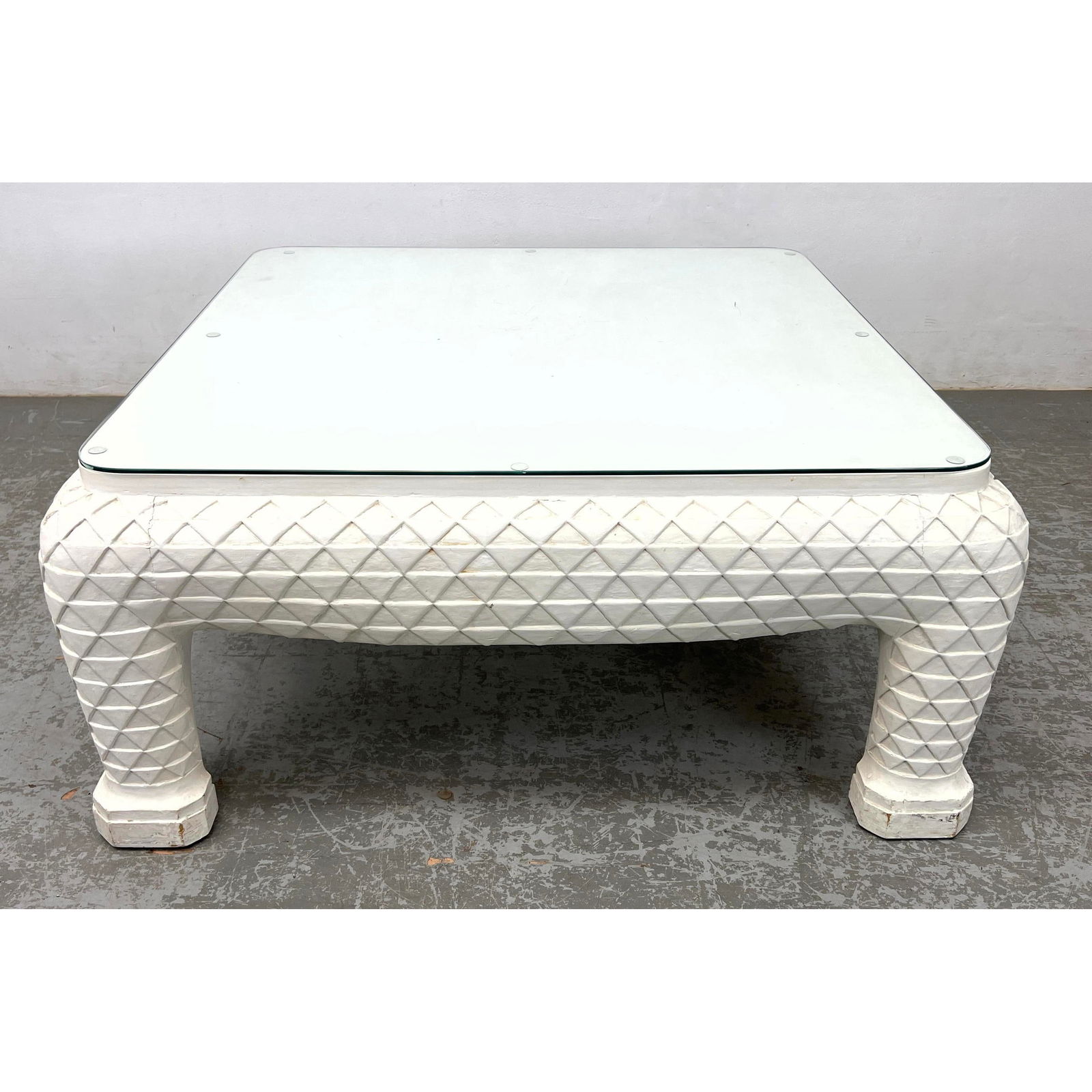 John Dickinson Style Miami Modern Cocktail Table. Glass top. Triangle textured frame base supports g: John Dickinson Style Miami Modern Cocktail Table. Glass top. Triangle textured frame base supports glass top. Dimensions: Height: 19 inches, Width: 43 inches, Depth: 43 inches. --- - We offer curbside