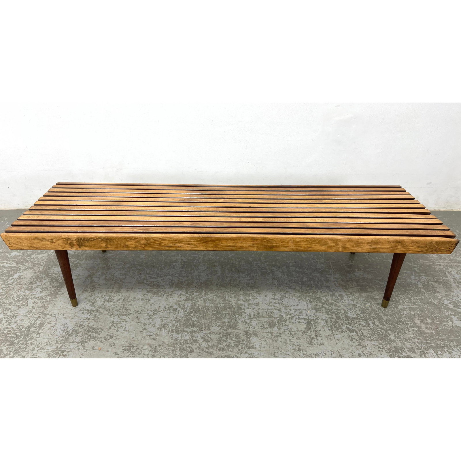Modern Slat Bench Table. Tapered Dark Wood Legs.: Modern Slat Bench Table. Tapered Dark Wood Legs. Dimensions: Height: 13 inches, Width: 60 inches, Depth: 18 inches. --- - We offer curbside delivery for most items to NYC, Manhattan, Close Brooklyn, H