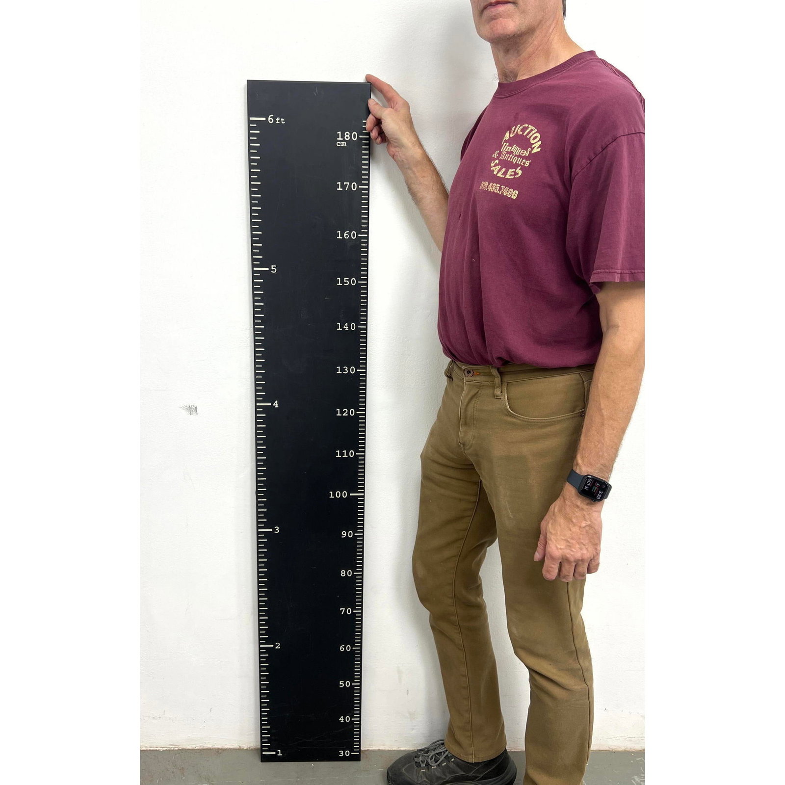Oversized decorative metal Ruler in Black Finish. Kent is 6'4".: Oversized decorative metal Ruler in Black Finish. Kent is 6'4". Dimensions: Height: 64 inches, Width: 10 inches, Depth: .75 inches. --- - We offer curbside delivery for most items to NYC, Manhattan, C