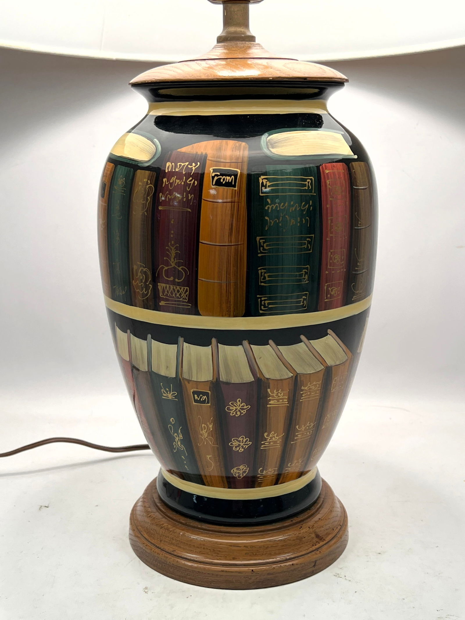 Book lamp in the style of Maitland Smith. Partial label, unreadable. Fornasetti style decoration. (1 of 10)