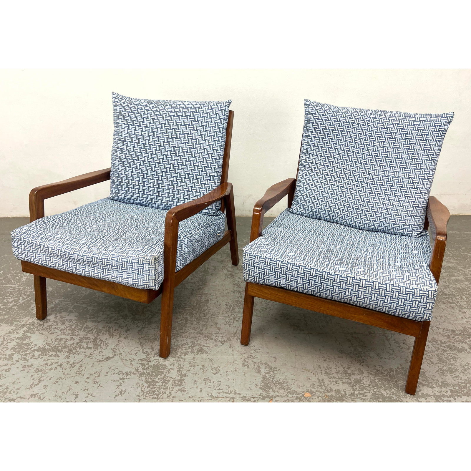 Pr Vintage Wide arm lounge chairs with vertical back slats. Attributed to Folk Olsen. Probably repla: Pr Vintage Wide arm lounge chairs with vertical back slats. Attributed to Folk Olsen. Probably replacement cushions. Dimensions: Height: 31.5 inches, Width: 27.5 inches, Depth: 31 inches. - Seat Heigh