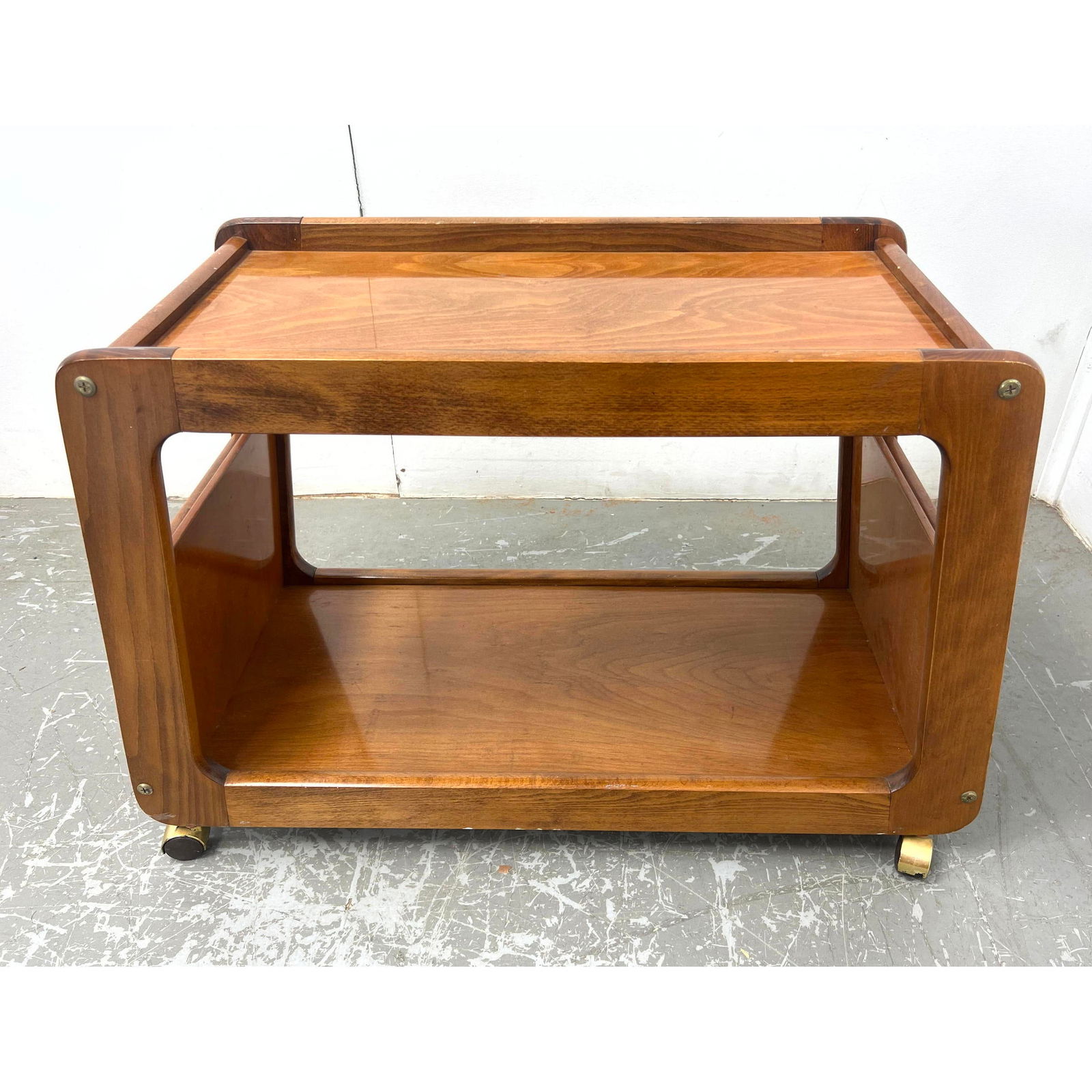 Vintage Rolling Magazine Side Table.: Vintage Rolling Magazine Side Table. Dimensions: Height: 24 inches, Width: 37 inches, Depth: 16.5 inches. --- - We offer curbside delivery for most items to NYC, Manhattan, Close Brooklyn, Hoboken abo