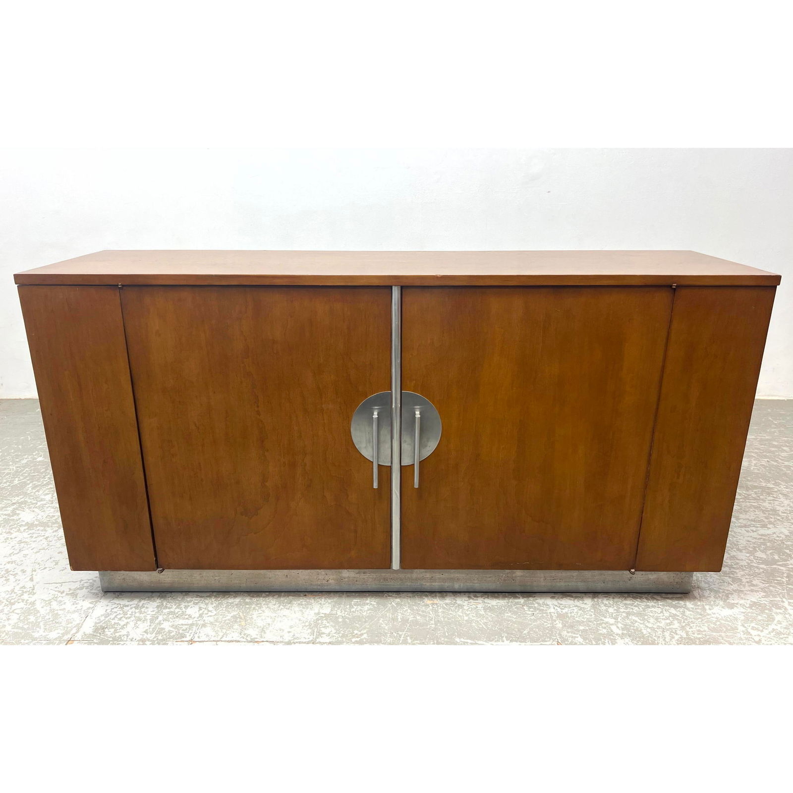 Walter Dorwin Teague for Hastings Credenza with chrome base. Side swing door with metal interior. (1 of 14)