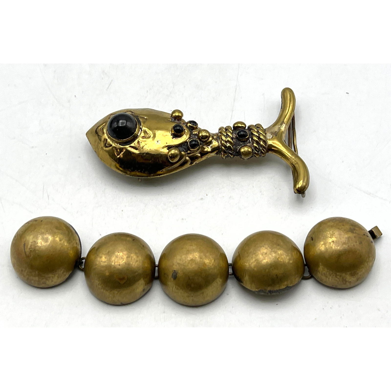 2pc HUBERT HARMON Brass Jewelry. Mexican. 5 Domed Elements Bracelet. Figural Fish Belt Buckle. Brace: 2pc HUBERT HARMON Brass Jewelry. Mexican. 5 Domed Elements Bracelet. Figural Fish Belt Buckle. Bracelet 6.5"L x 1"W Dimensions: Height: 2.25 inches, Width: 4 inches. --- US Packing and Shipping charge