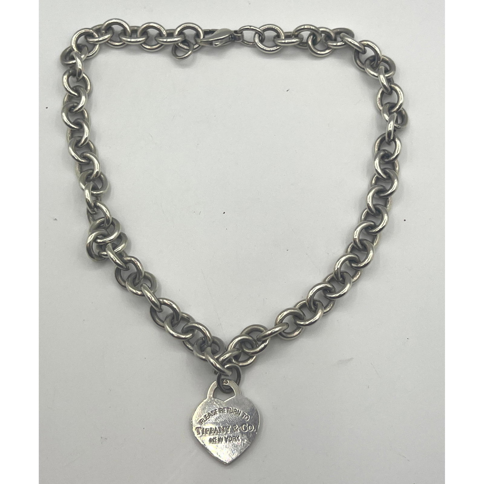 Tiffany and Company 925 Sterling "Return to Sender" Necklace. Heavy Link Chain. Marked: Tiffany and Company 925 Sterling "Return to Sender" Necklace. Heavy Link Chain. Marked Dimensions: Height: 16 inches, Width: inches. : L: 16 inches. Weight: 2.3 Troy ozs. --- US Packing and Shipping c