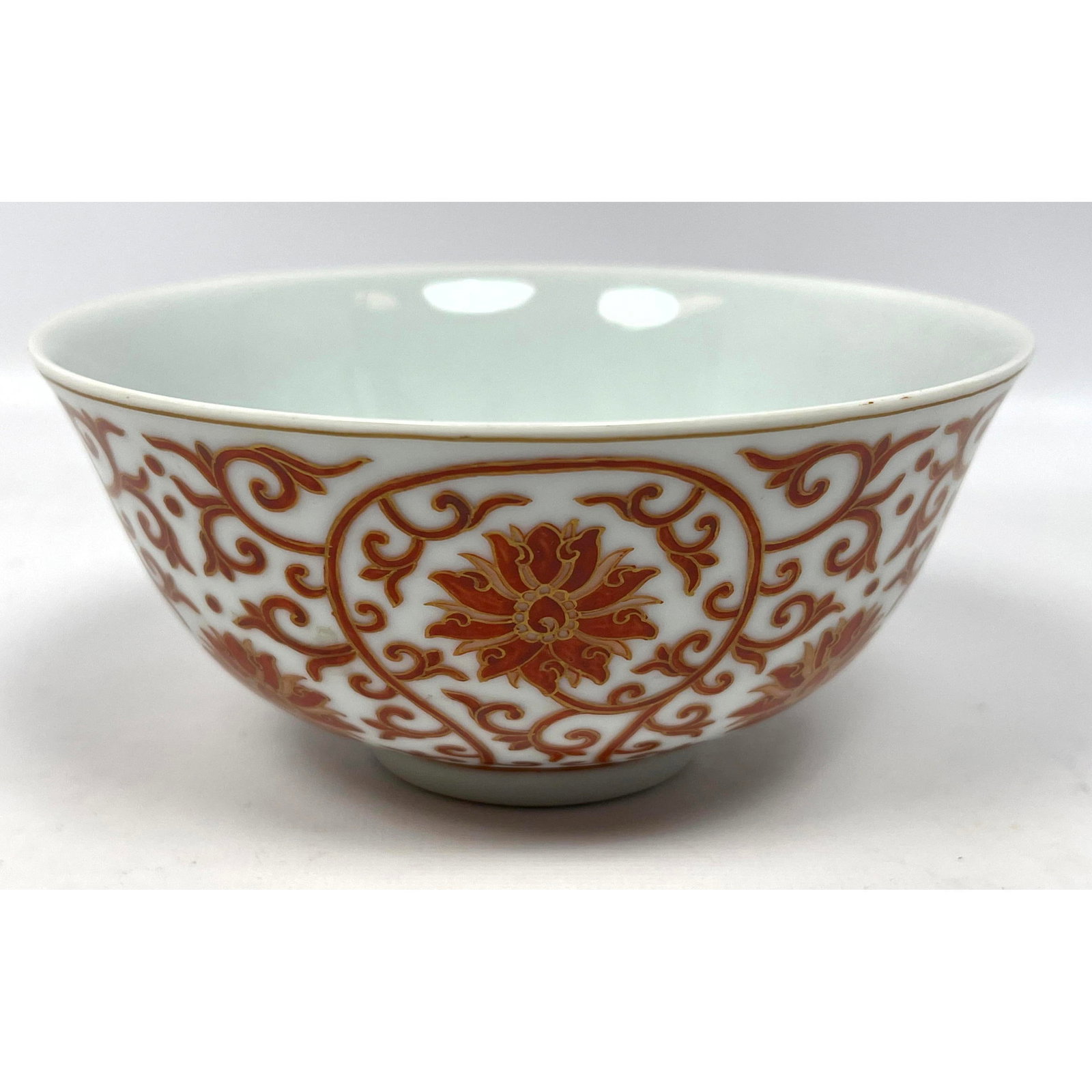 Chinese porcelain bowl with red and gold design marked: Chinese porcelain bowl with red and gold design marked Dimensions: Height: 2.75 inches, Width: 5.75 inches, Depth: 5.75 inches. --- US Packing and Shipping charge: $35 Plus insurance at a rate of $1 p