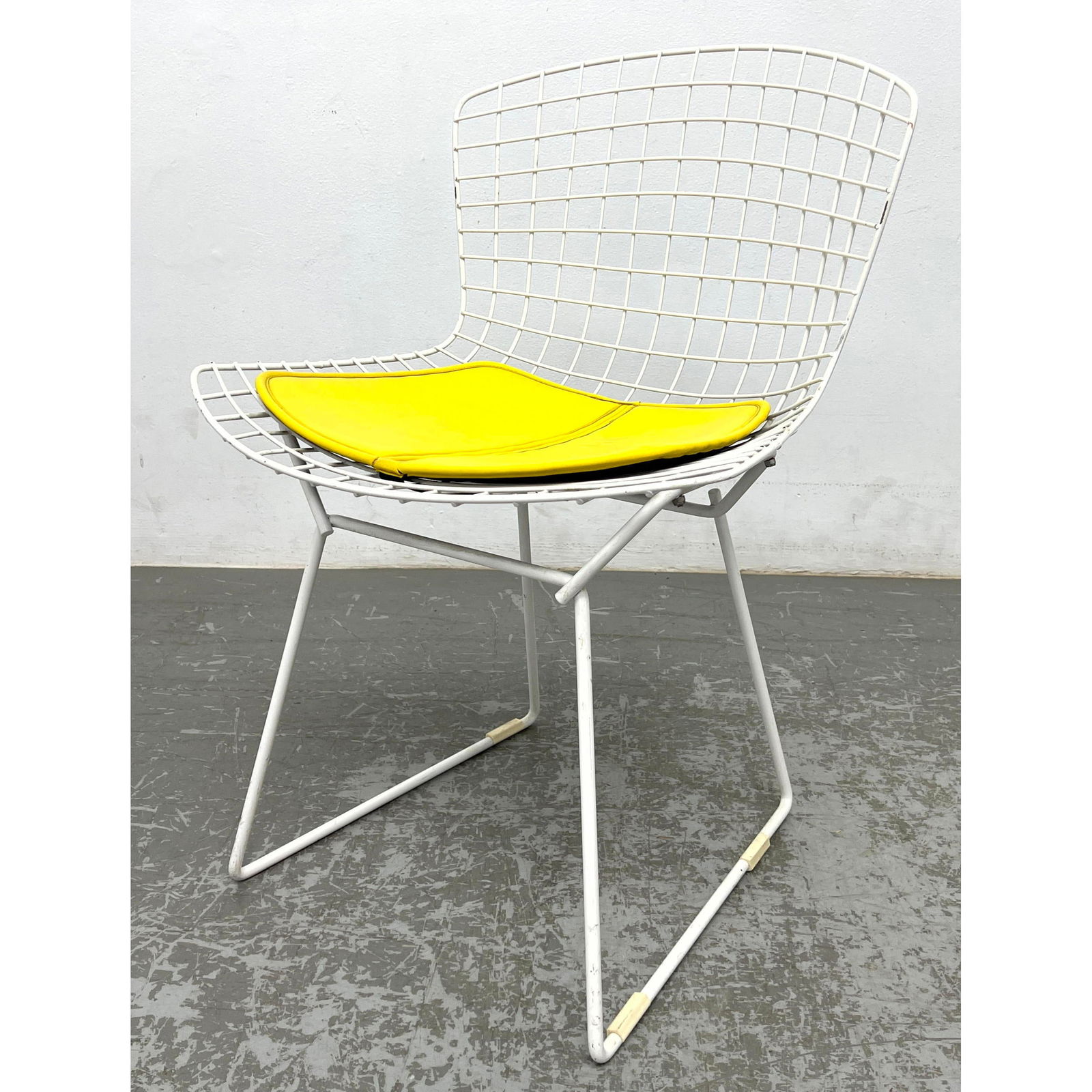 Bertoia for Knoll Grid Shell Chair. Marked on yellow cushion.: Bertoia for Knoll Grid Shell Chair. Marked on yellow cushion. Dimensions: Height: 30 inches, Width: 21.25 inches, Depth: 20.5 inches. - Seat Height: 18 inches --- - We offer curbside delivery for most