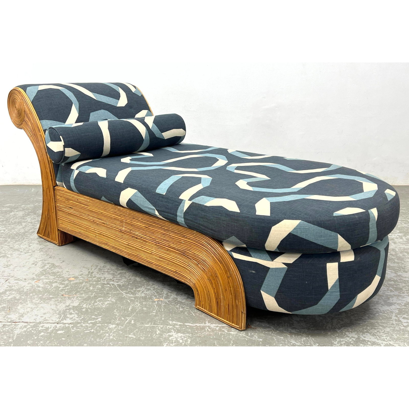Pencil Reed Chaise Lounge. Curved Lines. Graphic Upholstery and Bolster Pillow.: Pencil Reed Chaise Lounge. Curved Lines. Graphic Upholstery and Bolster Pillow. Dimensions: Height: 29 inches, Width: 29 inches, Depth: 66 inches. - Seat Height: 16.25 inches --- - We offer curbside d