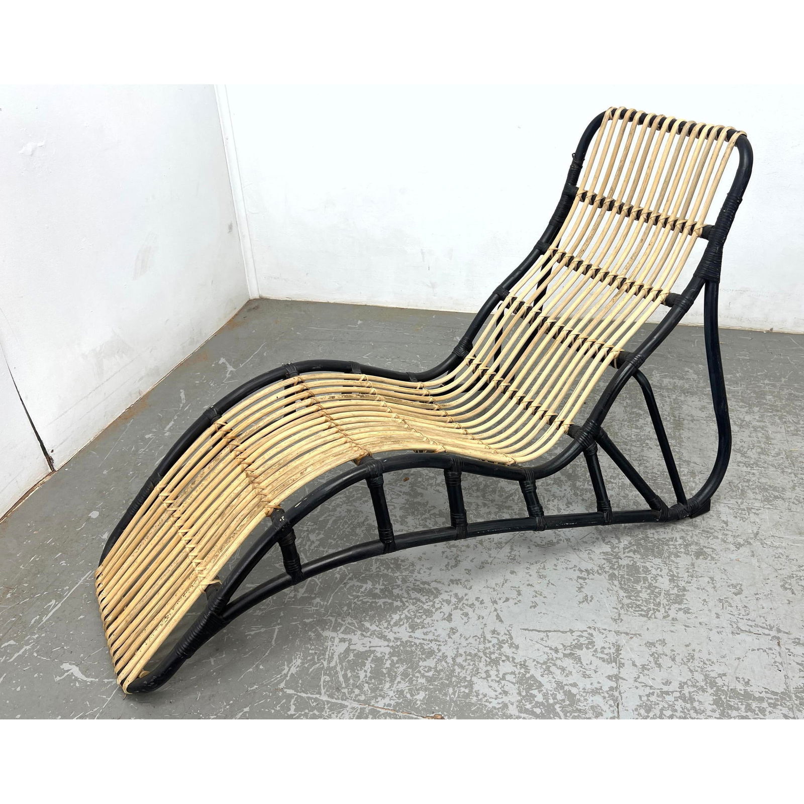 Dark and Natural Rattan Chaise Lounge Chair. Unsigned.: Dark and Natural Rattan Chaise Lounge Chair. Unsigned. Dimensions: Height: 32.5 inches, Width: 32 inches, Depth: 68 inches. --- - We offer curbside delivery for most items to NYC, Manhattan, Close Bro