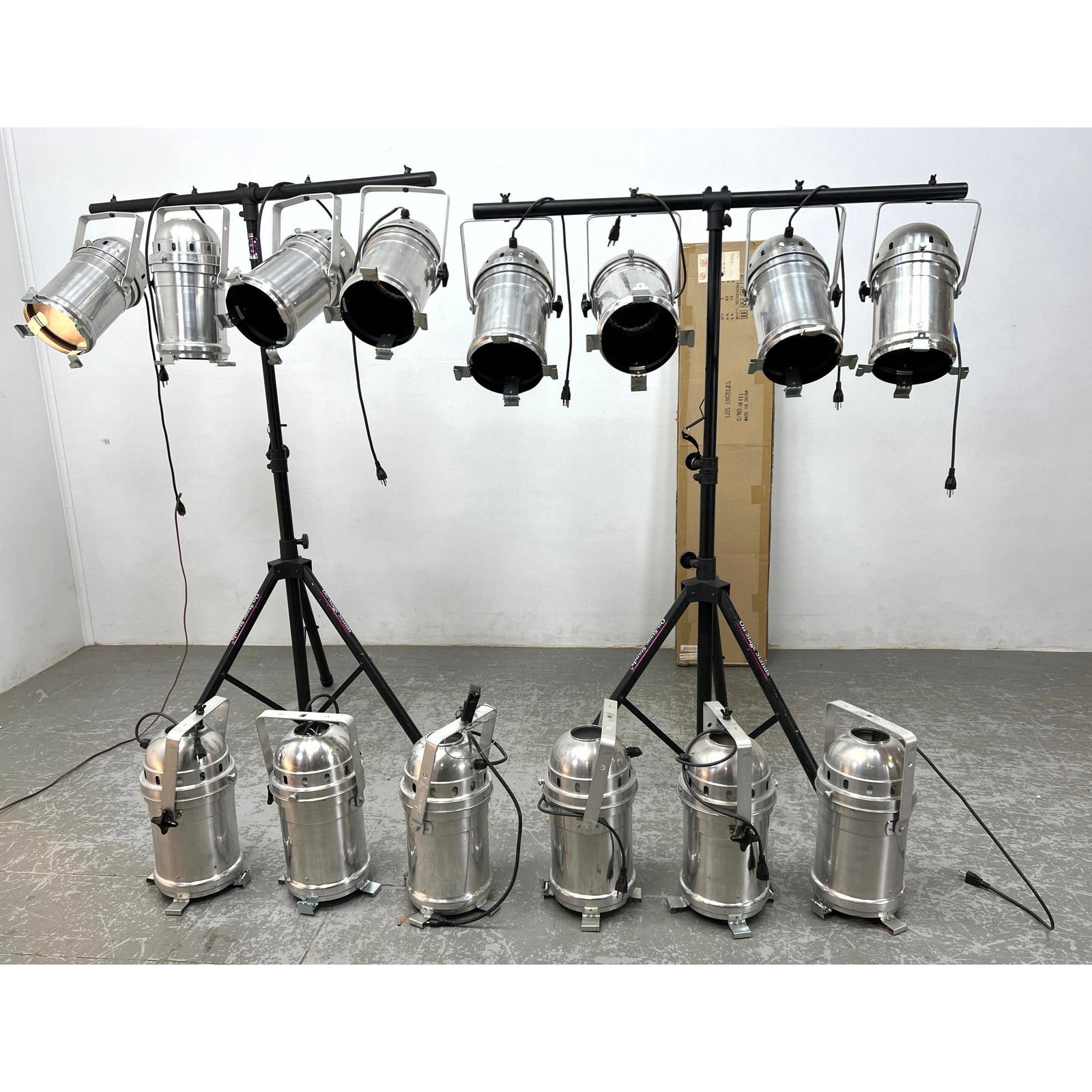 14 stage lights. American DJ Label. Halogen. 7.5 inch diameter lights. 2 stands by ON STAGE STANDS. (1 of 9)