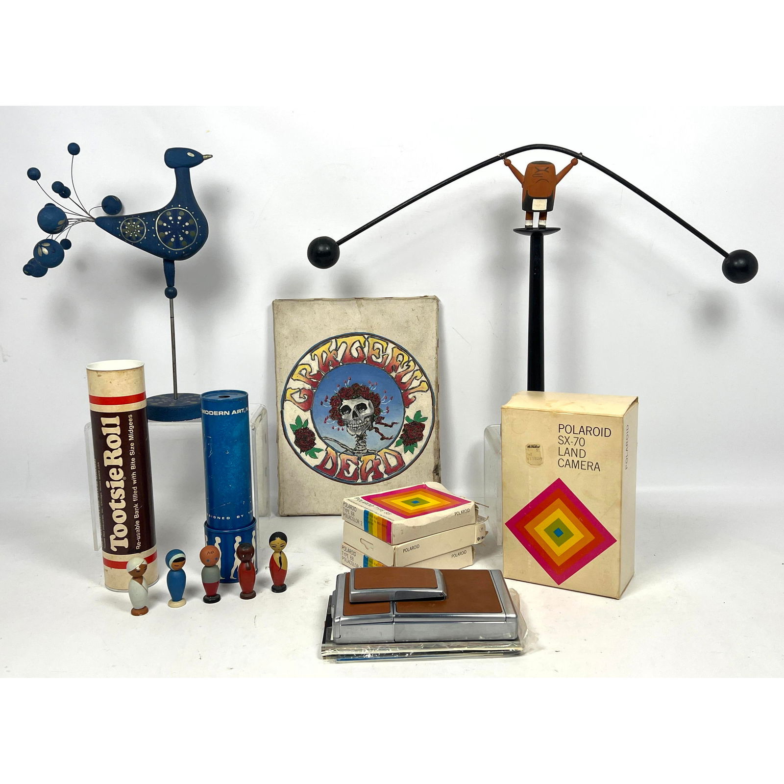 13pc lot: Polaroid land camera in original box with film, Grateful Dead painting on canvas, Ernest T: 13pc lot: Polaroid land camera in original box with film, Grateful Dead painting on canvas, Ernest Trova kaleidoscope, Boras Sweden Bird, Dimensions: Height: 13 inches, Width: 10 inches, Depth: 7 inch