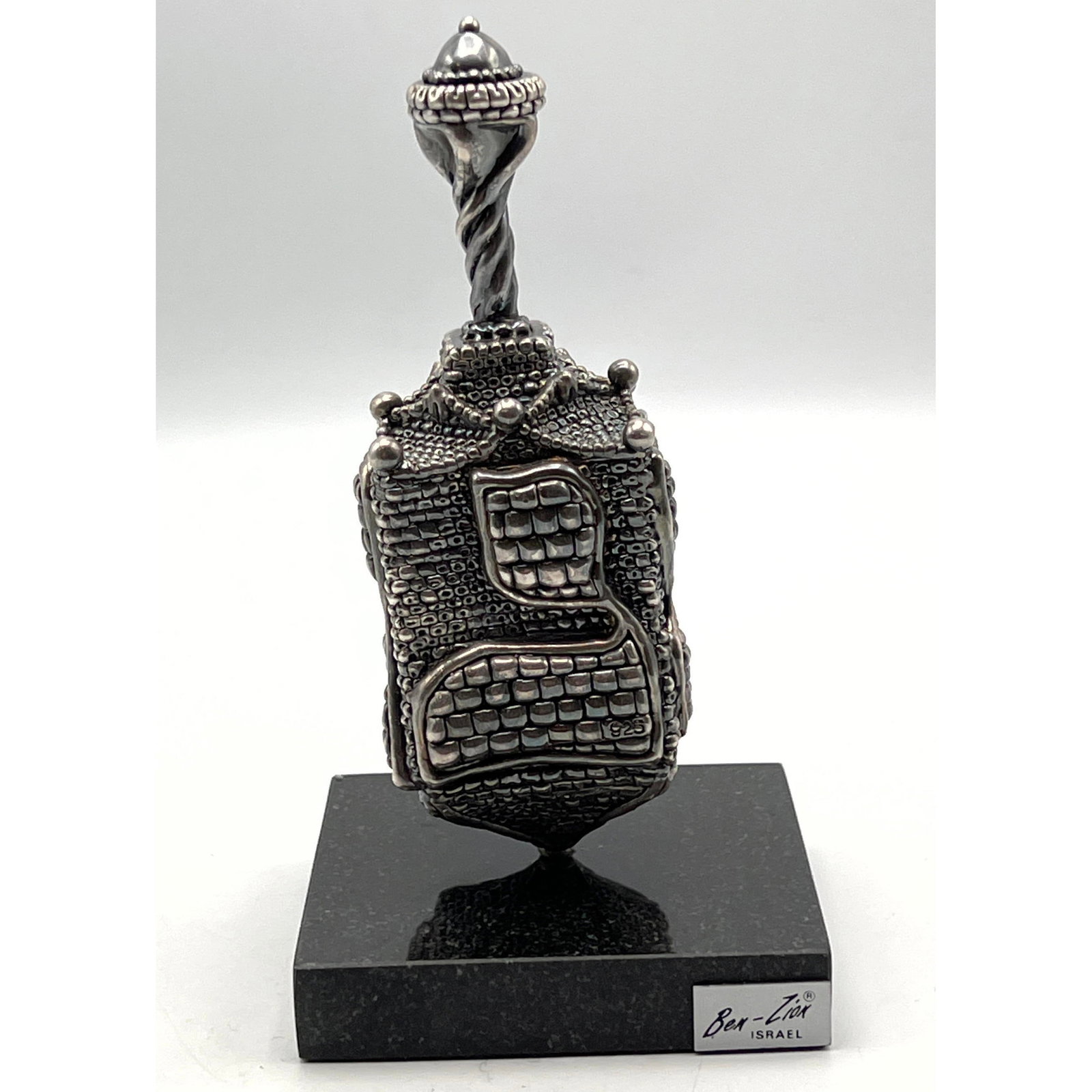 Ben Zion Sterling Dreidel Sculpture on Marble Base.: Ben Zion Sterling Dreidel Sculpture on Marble Base. Watch the video on our YouTube channel @uniquesitems, Copy and paste URL. https://www.youtube.com/watch?v=BvuowanmK1E Dimensions: Height: 7.25 inch