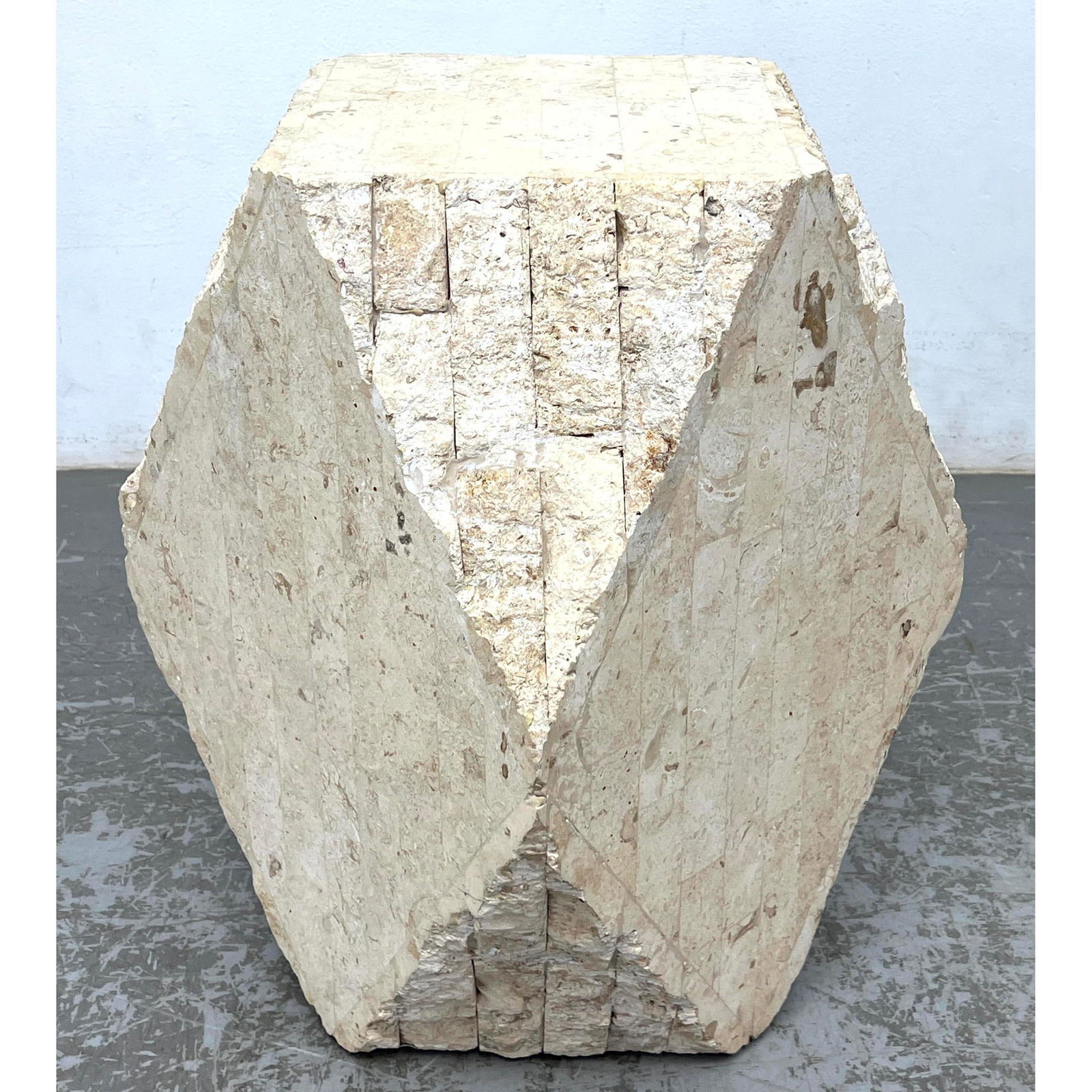 Tessellated stone and wood angular pedestal. (1 of 8)