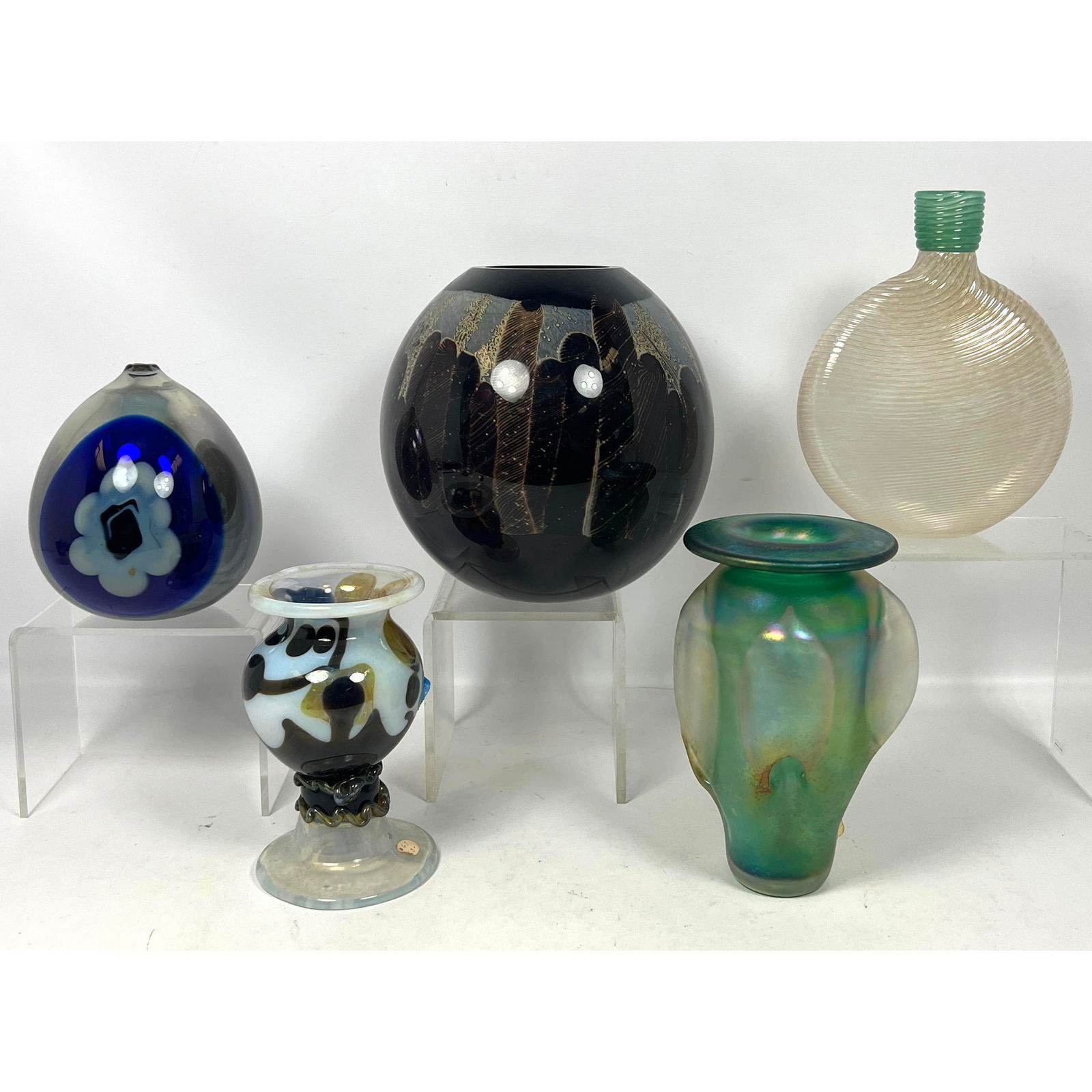 5pc American Studio Art Glass Vases. George Thiewes, Paul Bindman, etc. NEW Old Store Stock stored f: 5pc American Studio Art Glass Vases. George Thiewes, Paul Bindman, etc. NEW Old Store Stock stored from Closed Craft Gallery. Dimensions: Height: 8.5 inches, Width: 8.5 inches, Depth: 8.5 inches. ---