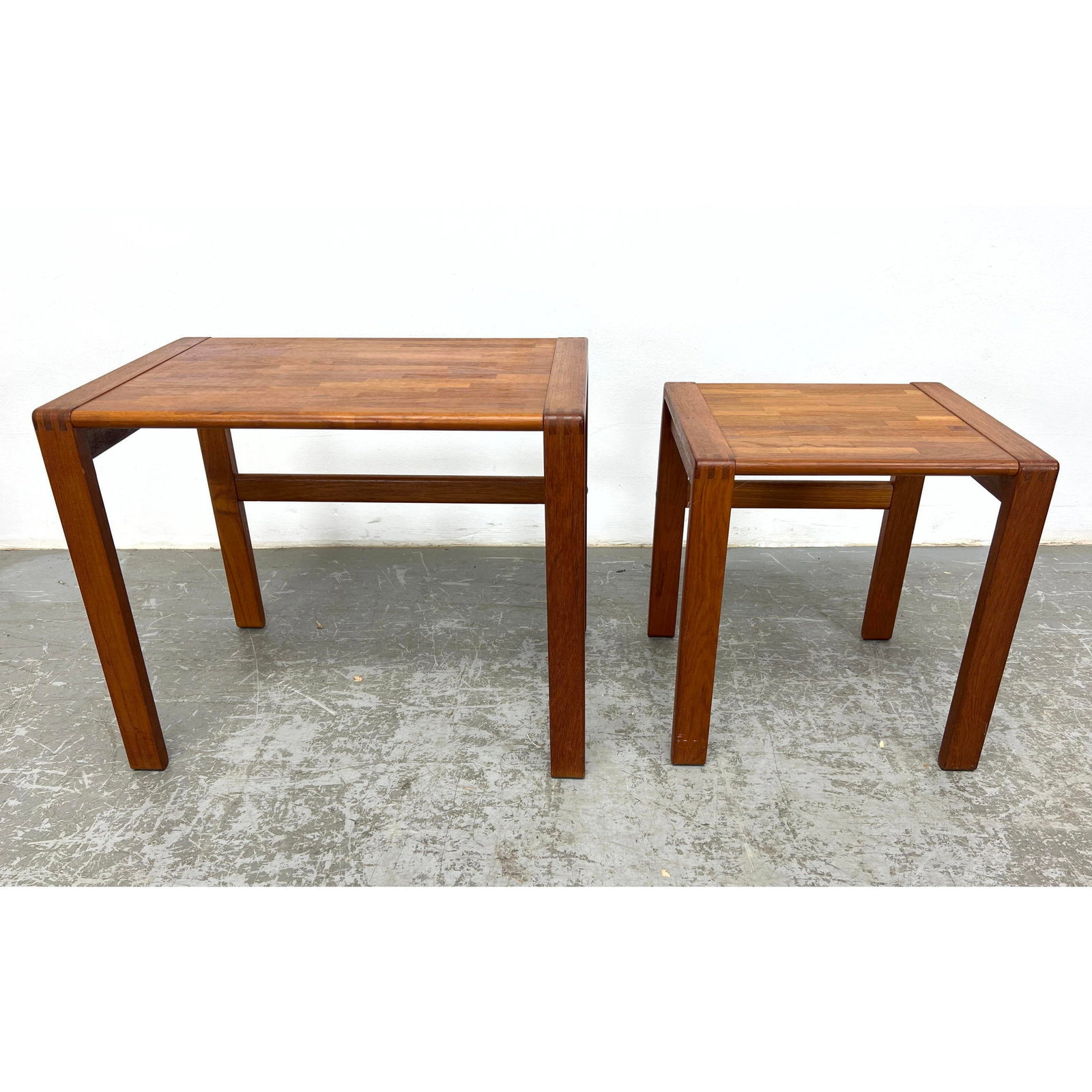 2pcs Danish Modern Teak Tables. Finger joint ends.: 2pcs Danish Modern Teak Tables. Finger joint ends. Dimensions: Height: 19.5 inches, Width: 23.5 inches, Depth: 15.75 inches. ---