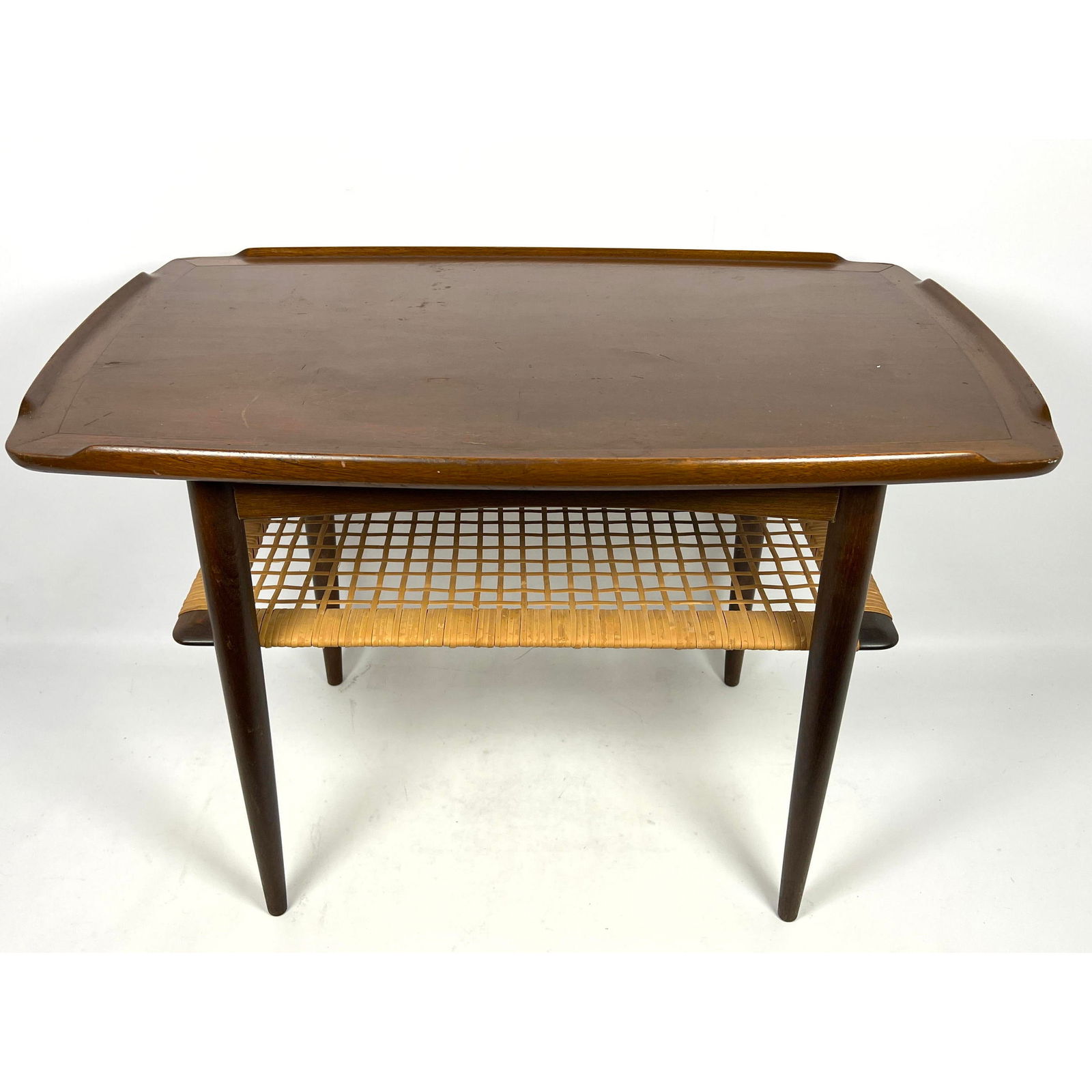 Paul Jensen for SELIG Two tier side table. Danish Modern. Marked Selig, Denmark. Caned.: Paul Jensen for SELIG Two tier side table. Danish Modern. Marked Selig, Denmark. Caned. Dimensions: Height: 20 inches, Width: 30 inches, Depth: 18 inches. ---