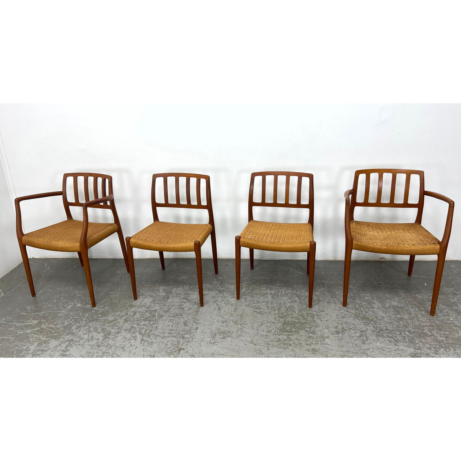Set 4 J.L. Moller Danish Modern Teak Dining Chairs. 2 with arms. Rush seats. (1 of 14)