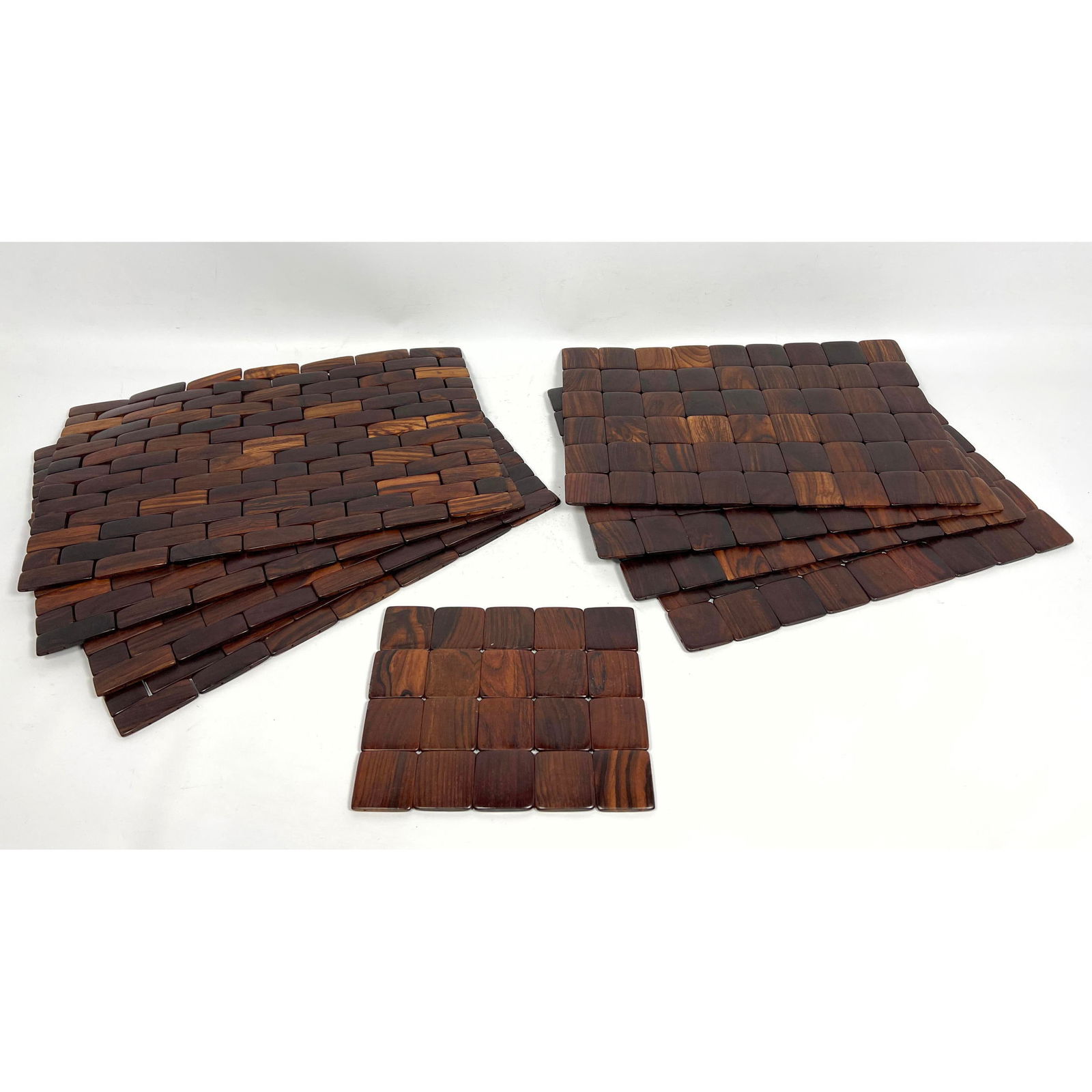9pc Rosewood Parquet tiles place mats and trivet. 4 16x10 and 4 -15x10 plus trivet.: 9pc Rosewood Parquet tiles place mats and trivet. 4 16x10 and 4 -15x10 plus trivet. Dimensions: Height: 16.5 inches, Width: 10.5 inches. - Additional Dimensions: Smaller H: 15 inches, W: 10.25 inches