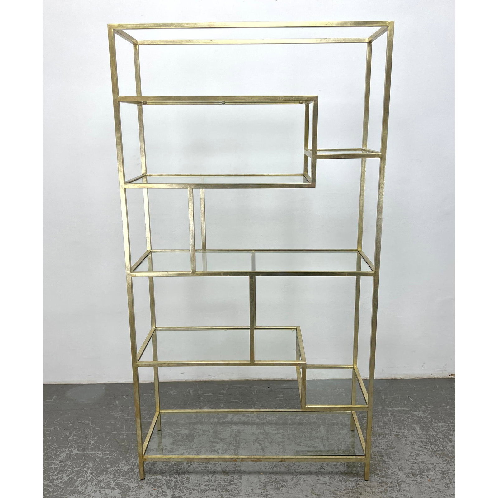Hooker furniture Gilt Metal and Glass Shelf Etagere Unit. Label 2015: Hooker furniture Gilt Metal and Glass Shelf Etagere Unit. Label 2015 Dimensions: Height: 78 inches, Width: 42 inches, Depth: 16 inches. ---