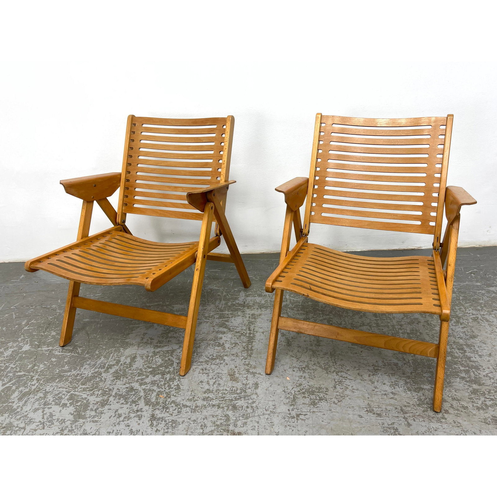 Pair Niko Kralj for Stol REX Beech Bentwood Folding Armchairs. One with partial label: Pair Niko Kralj for Stol REX Beech Bentwood Folding Armchairs. One with partial label Dimensions: Height: 28.5 inches, Width: 22 inches, Depth: 26 inches. - Seat Height: 14 inches ---