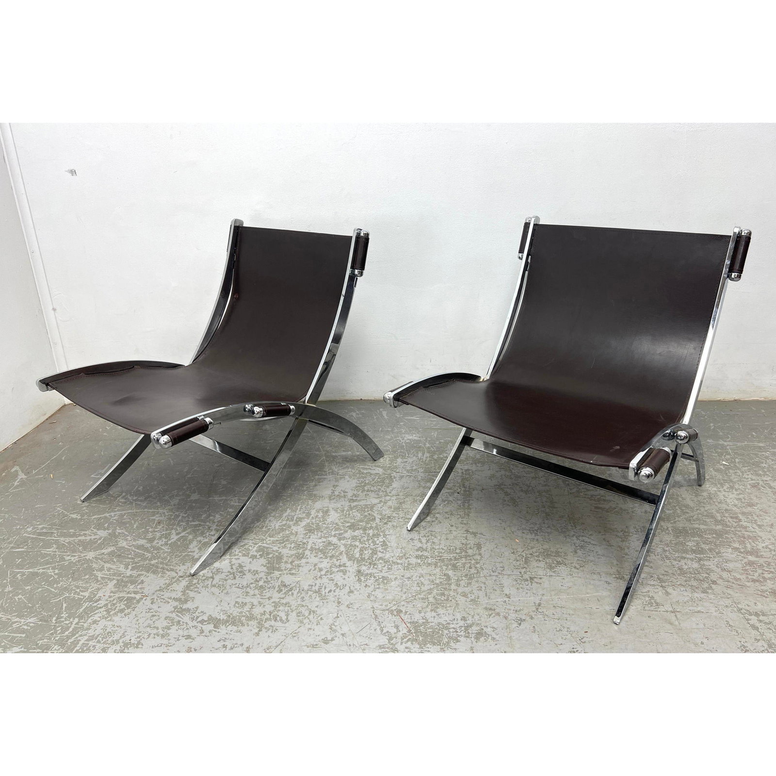 Pair Antonio Citterio Scissor Chairs. Chrome frames. Unmarked.: Pair Antonio Citterio Scissor Chairs. Chrome frames. Unmarked. Dimensions: Height: 29.5 inches, Width: 26 inches, Depth: 28 inches. - Seat Height: 14.5 inches ---
