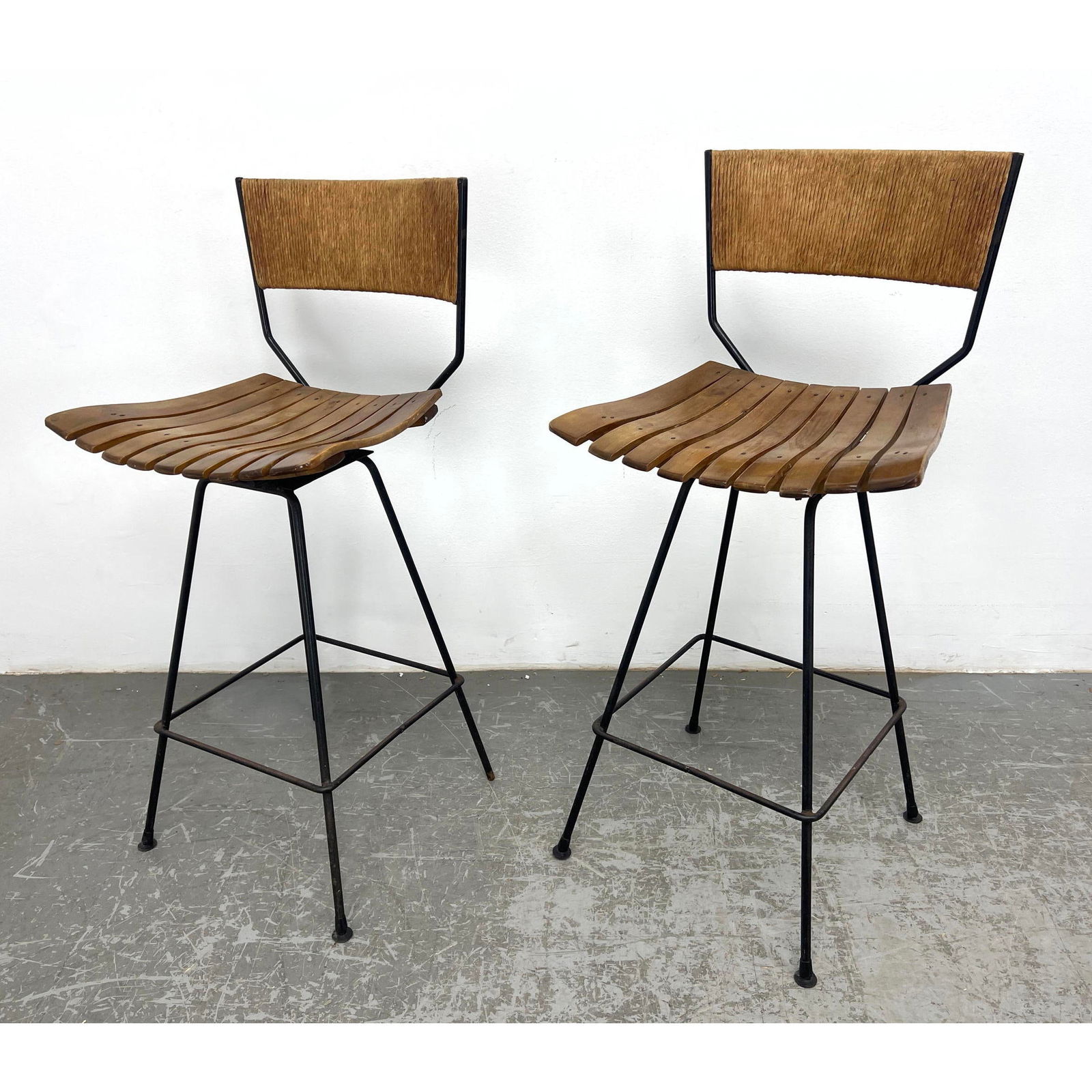 Pr Wood Slat Seat Iron Base ARTHUR UMANOFF Swivel Bar Stools.: Pr Wood Slat Seat Iron Base ARTHUR UMANOFF Swivel Bar Stools. Dimensions: Height: 39 inches, Width: 18 inches, Depth: 18 inches. - Seat Height: 26 inches ---