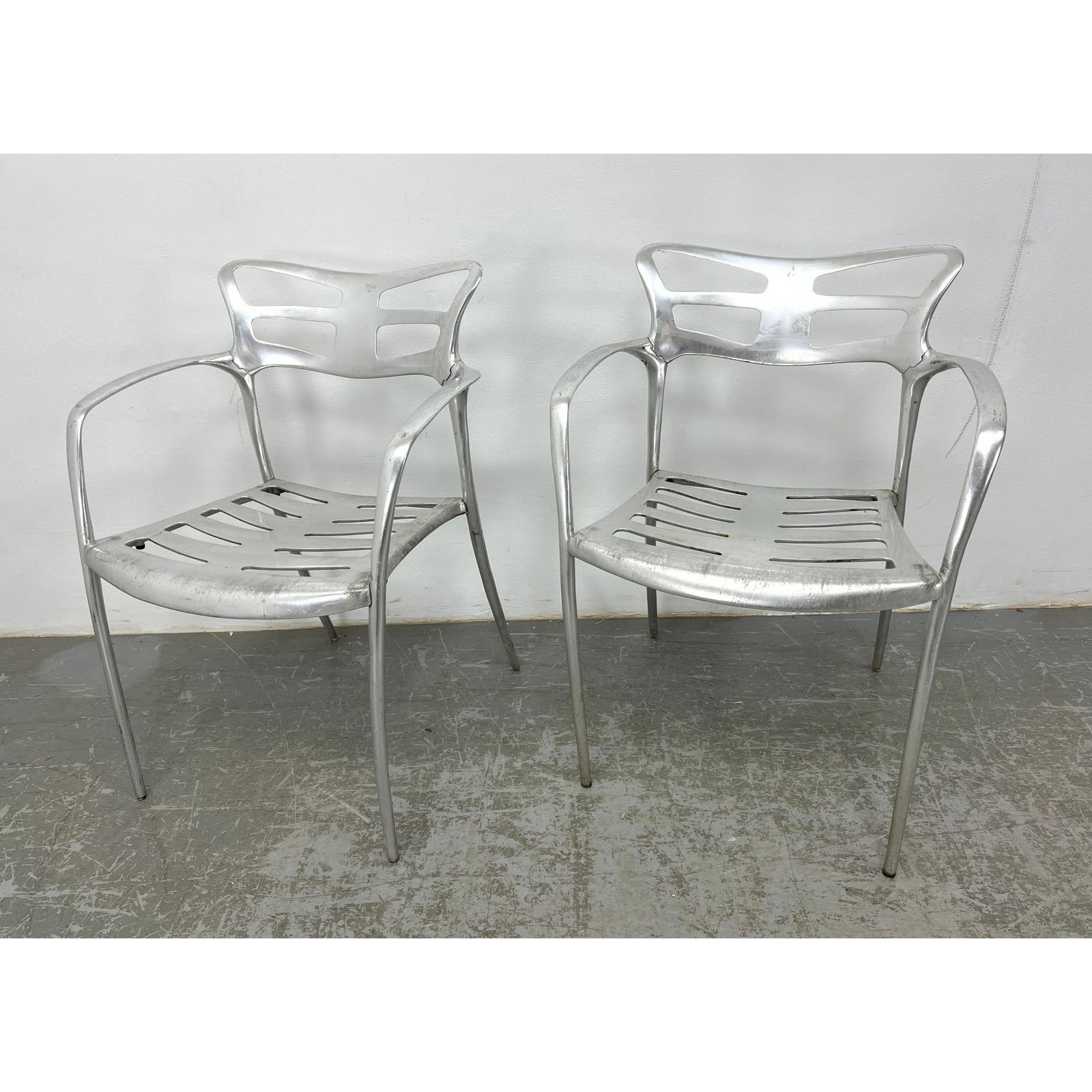 Pair Post modern aluminum skeletal design arm chairs (1 of 15)