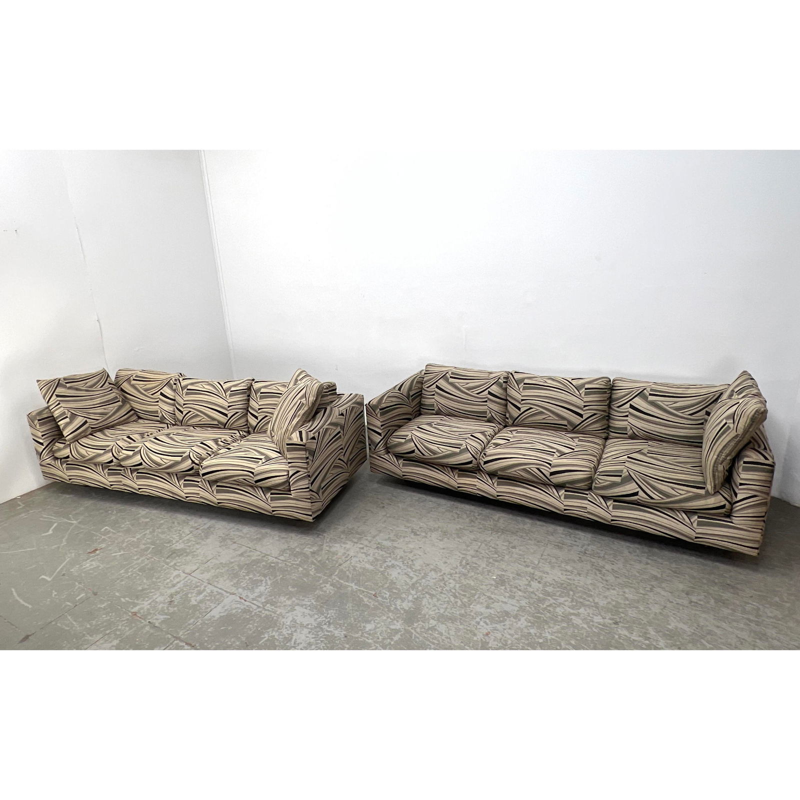 2pc Modernist Patterned Upholstery Love Seat, Couch. Each on wood peg legs.: 2pc Modernist Patterned Upholstery Love Seat, Couch. Each on wood peg legs. Dimensions: Height: 25 inches, Width: 83 inches, Depth: 32 inches. - Seat Height: 15 inches --- - We offer curbside delivery