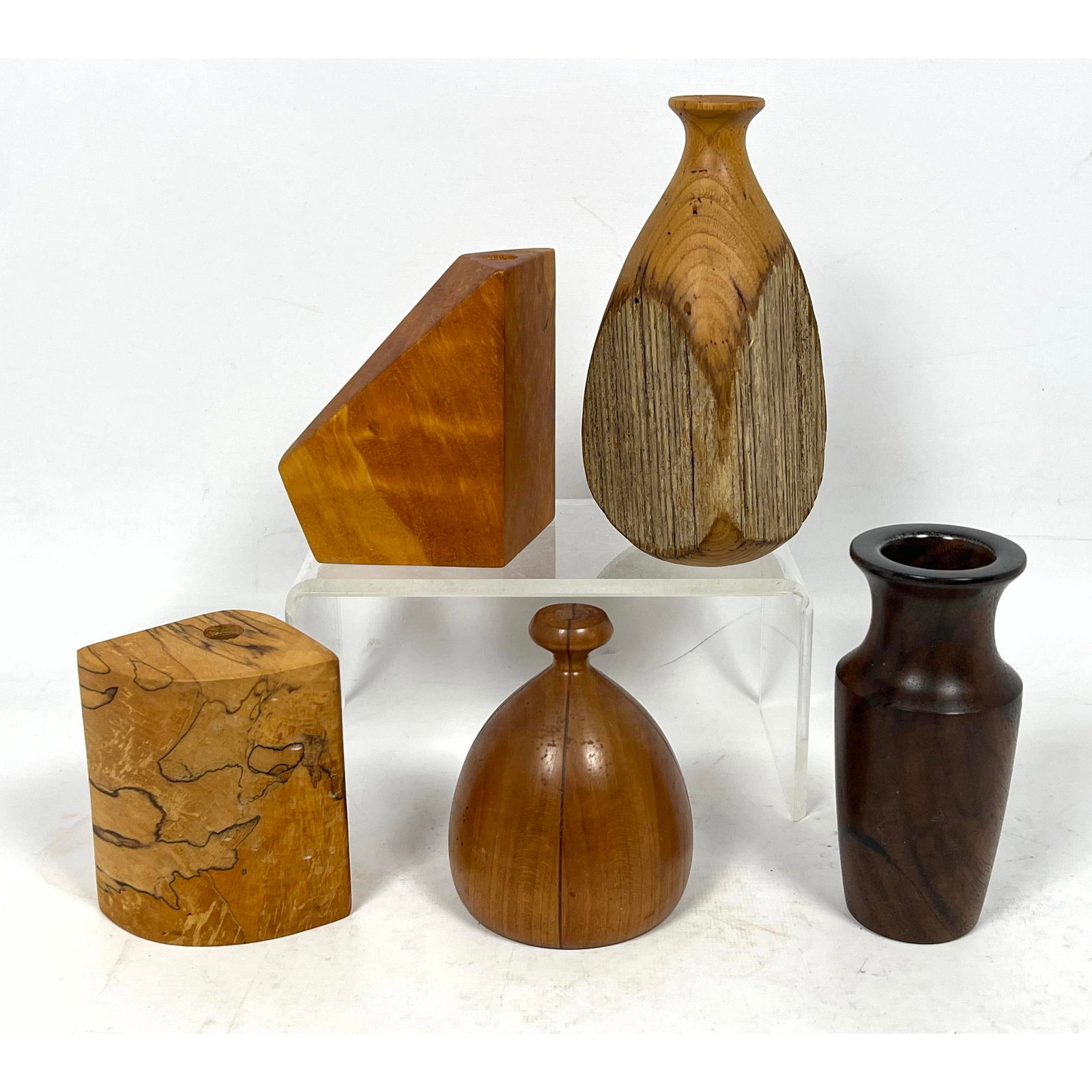 5 Piece Artisan Made Exotic Woods Vases: 5 Piece Artisan Made Exotic Woods Vases Dimensions: Height: 6.5 inches, Width: 3 inches, Depth: 3 inches. --- US Packing and Shipping charge: In house shipping available. Will be calculated once desti