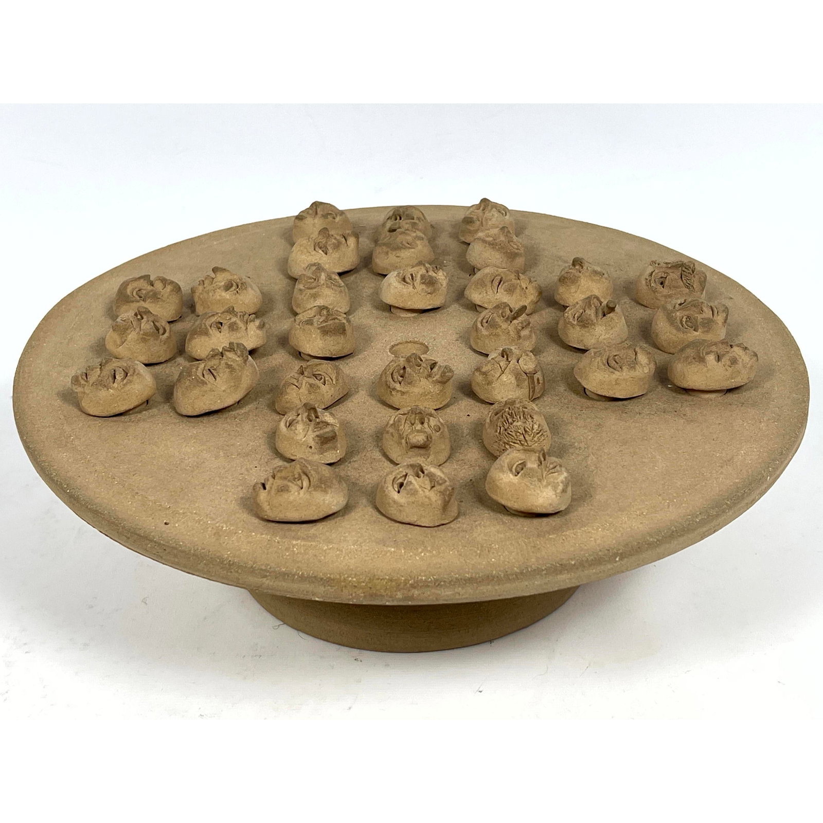 Pottery faces HI Q game. Signed by Studio Artisan. (1 of 11)