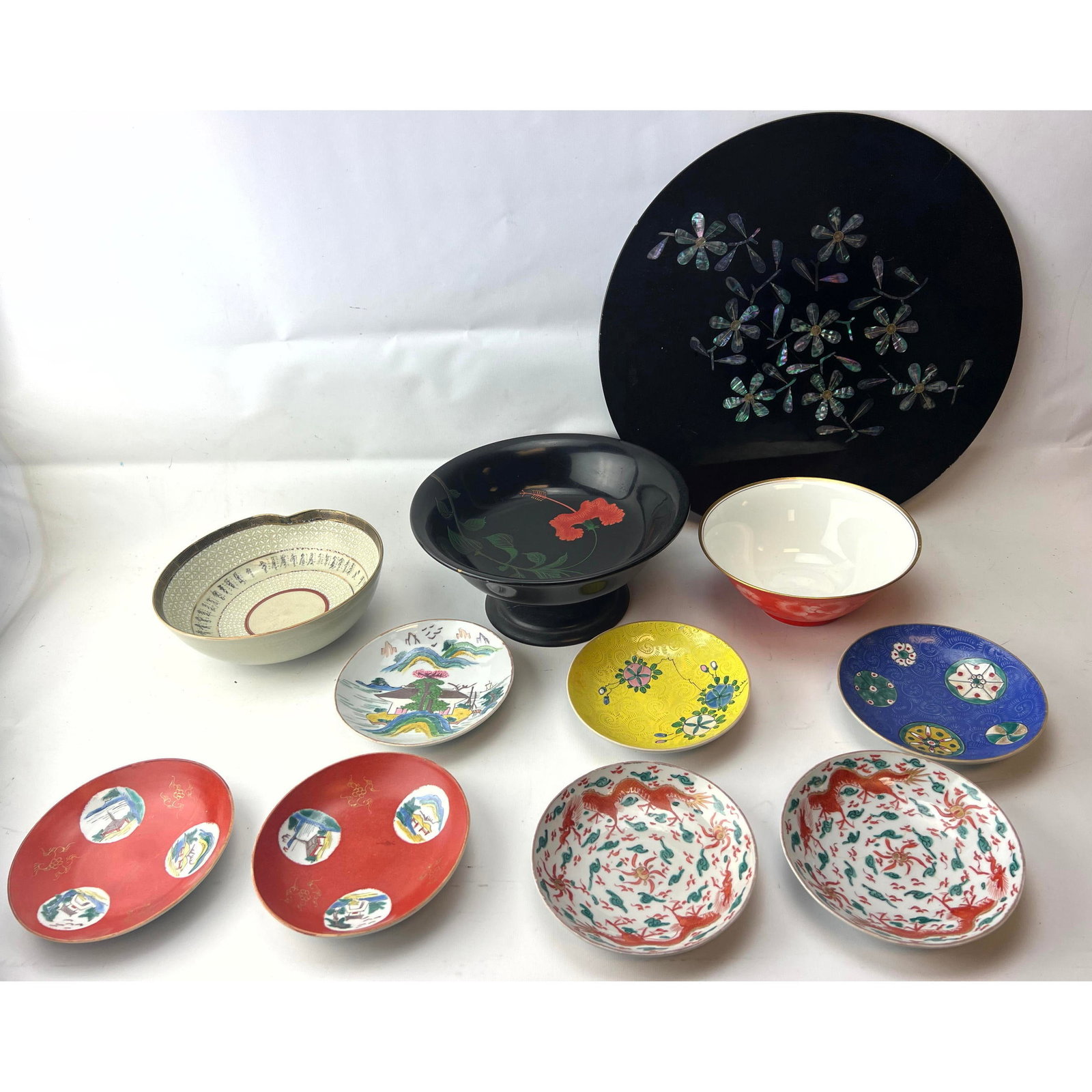 Collection Japanese and Asian Decorative Bowls. Mostly glazed designs. One lacquer plate with inlaid: Collection Japanese and Asian Decorative Bowls. Mostly glazed designs. One lacquer plate with inlaid Abalone. Dimensions: Height: 4.75 inches, Width: 10 inches, Depth: 10 inches. --- US Packing and Sh