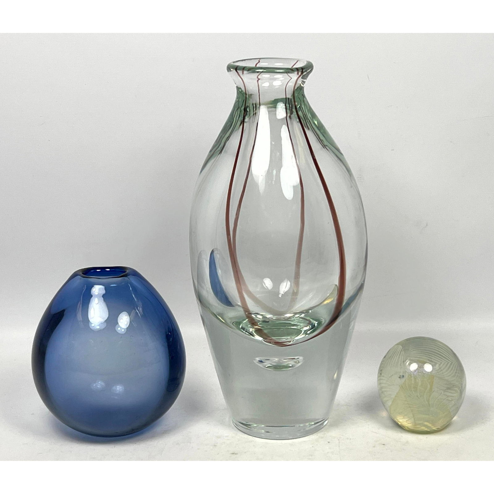 3pc Lot of Art Glass. Holmegaard Vase, Decorated vase, and Eickholt Paperweight. Signed: 3pc Lot of Art Glass. Holmegaard Vase, Decorated vase, and Eickholt Paperweight. Signed Dimensions: Height: 14 inches, Width: 6.5 inches, Depth: 6.5 inches. - Additional Dimensions: Blue H: 6.5 inches