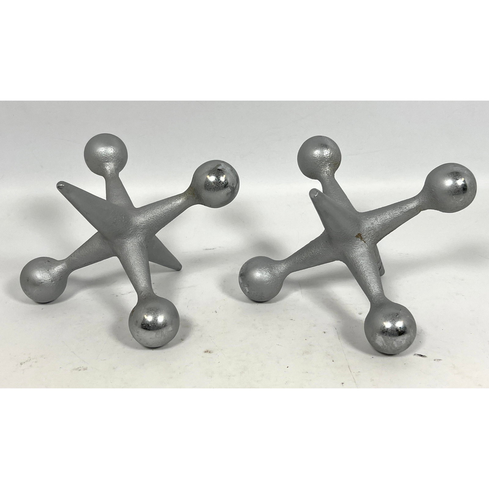 Pair of oversized Steel Jack Jax Bookends. Bill Curry. Unmarked. (1 of 9)