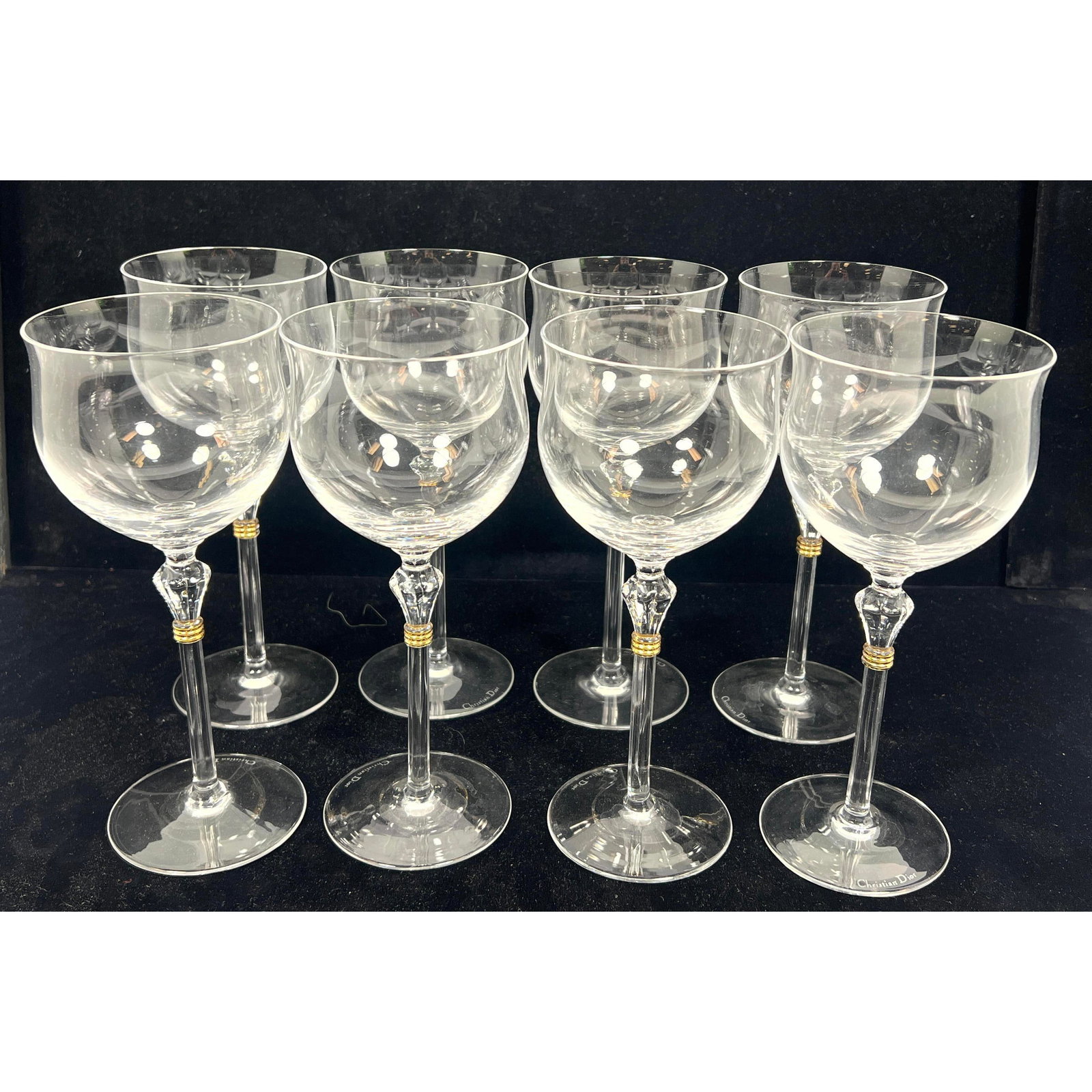 Set 8 Christian Dior Bijoux wine glasses. Gold Triple Band Accent. Marked.: Set 8 Christian Dior Bijoux wine glasses. Gold Triple Band Accent. Marked. Dimensions: Height: 8.5 inches, Width: 3.5 inches, Depth: 3.5 inches. --- US Packing and Shipping charge: In house shipping a