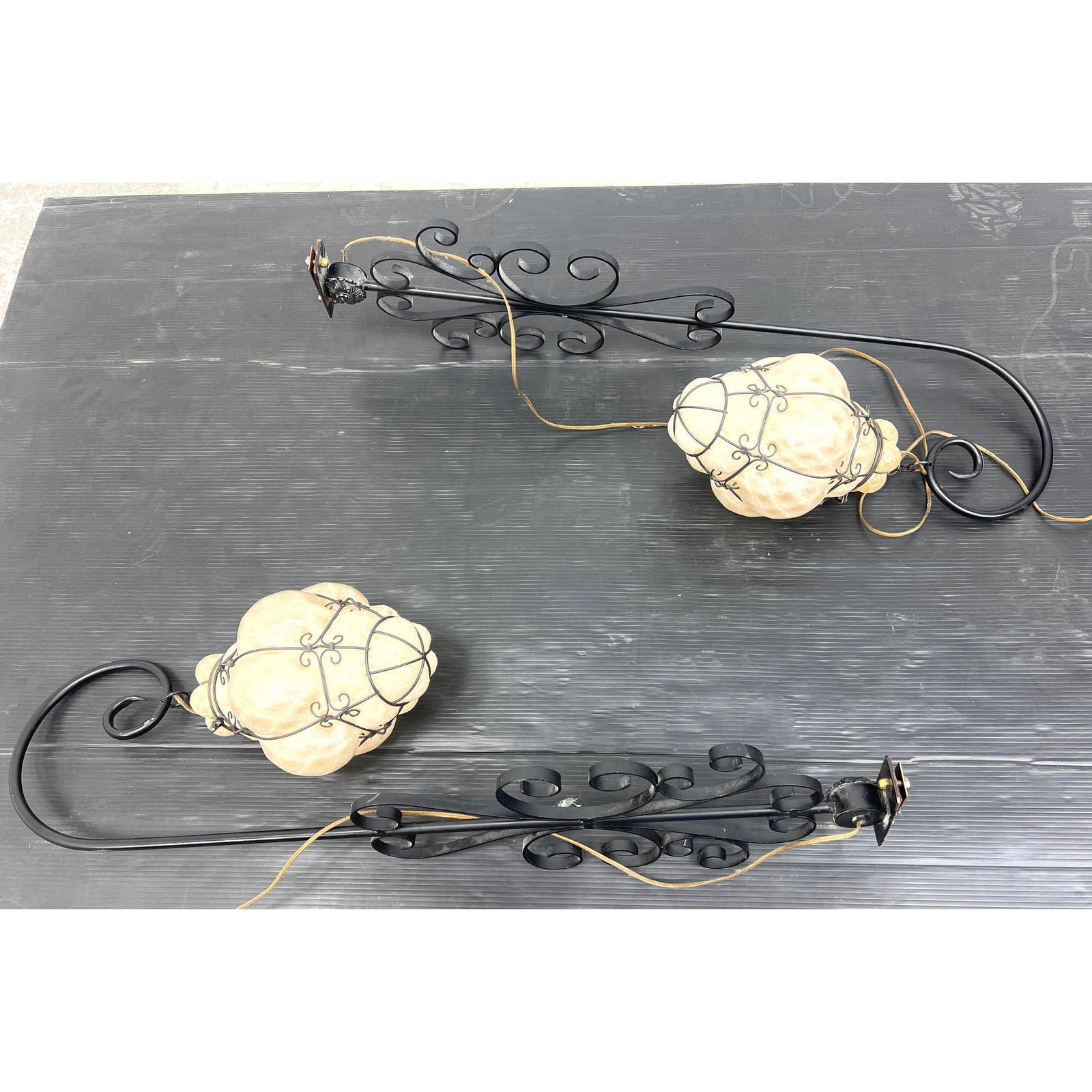 Pr Murano Venetian Blown Glass in Iron Frame Sconces. Decorative Metal Arms support Hanging Glass Sh: Pr Murano Venetian Blown Glass in Iron Frame Sconces. Decorative Metal Arms support Hanging Glass Shades. Dimensions: Height: 39.5 inches, Width: 11 inches, Depth: 12 inches. --- US Packing and Shippi