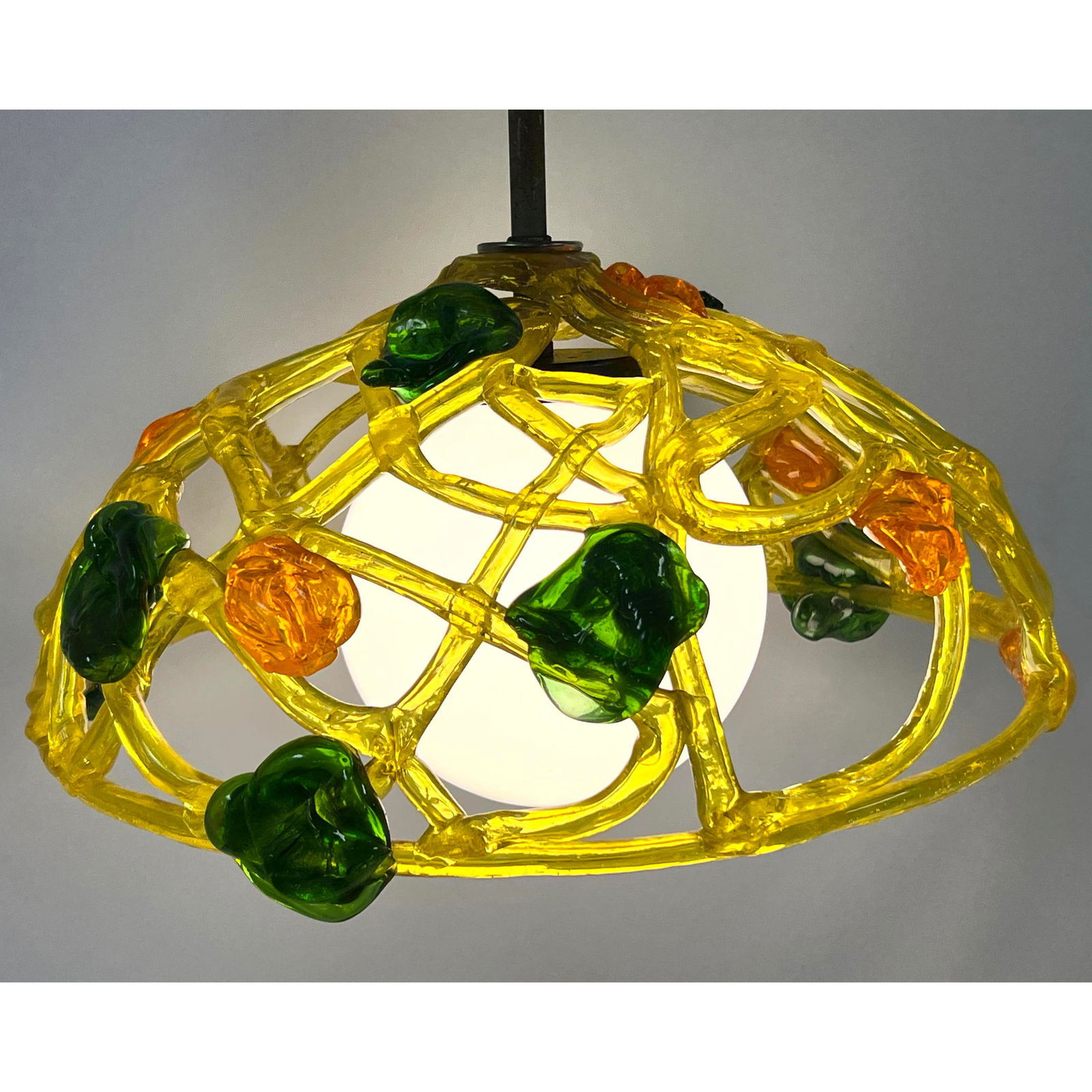 1970s era Taffy style Chandelier Translucent plastic. Long cord and chain.: 1970s era Taffy style Chandelier Translucent plastic. Long cord and chain. Dimensions: Height: 14 inches, Width: 19 inches, Depth: 19 inches. ---