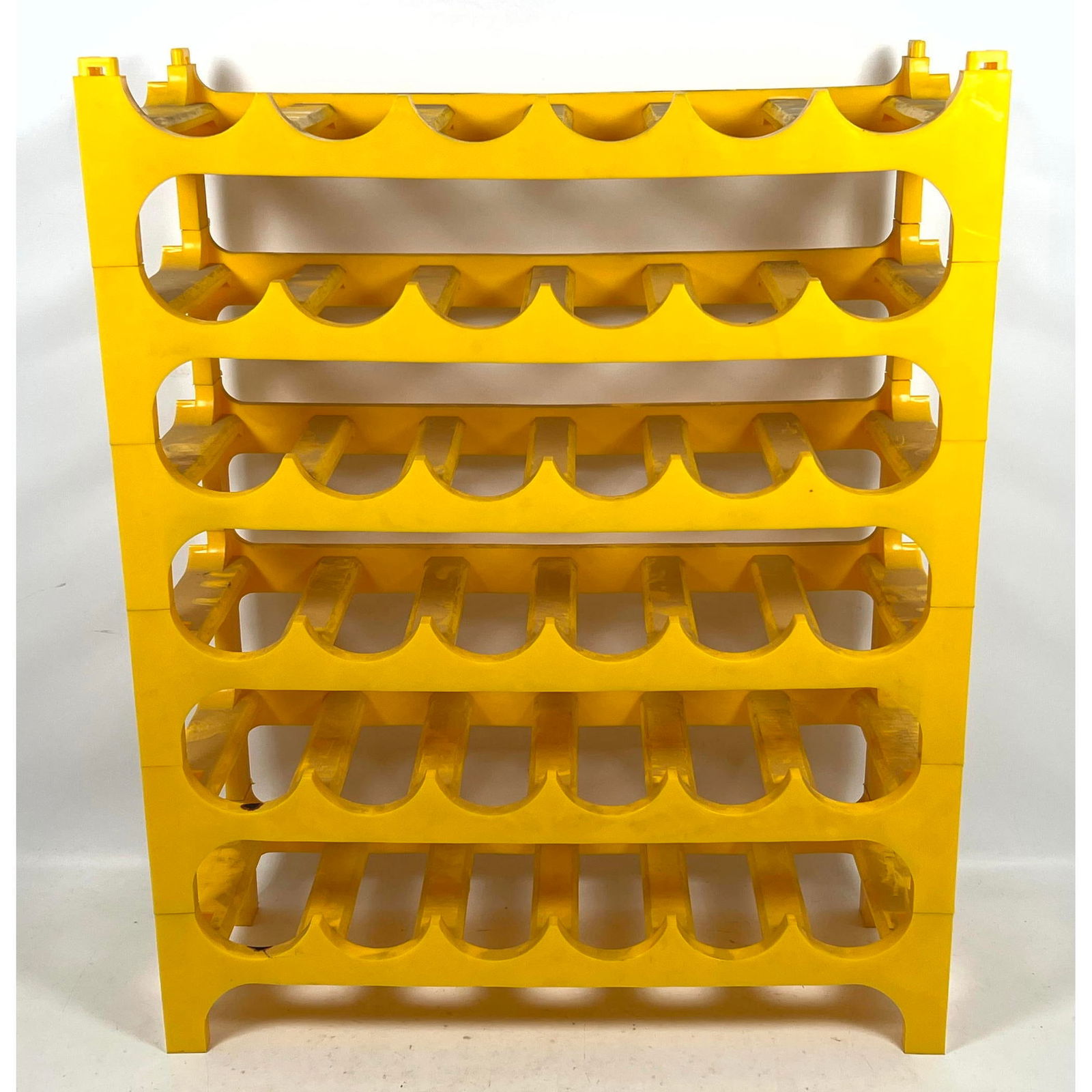 6pc SOMM PARIS Modular Yellow Plastic Wine Racks. Modernist 70's Design Stacking Shelves hold wine o: 6pc SOMM PARIS Modular Yellow Plastic Wine Racks. Modernist 70's Design Stacking Shelves hold wine or liquor bottles. Can be stacked at various heights. Easy to transport and move. Marked Dimensions: