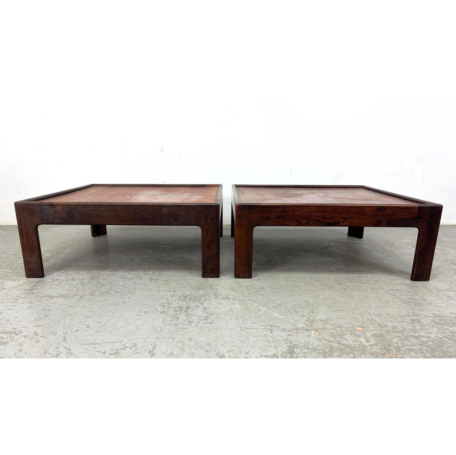 Pr Rosewood Danish Modern Square Coffee Tables. ILLUM WIKKELSO for NIELS EILERSEN. Raised Lip Trim.: Pr Rosewood Danish Modern Square Coffee Tables. ILLUM WIKKELSO for NIELS EILERSEN. Raised Lip Trim. No marks. Dimensions: Height: 12 inches, Width: 29.5 inches, Depth: 29.5 inches. ---