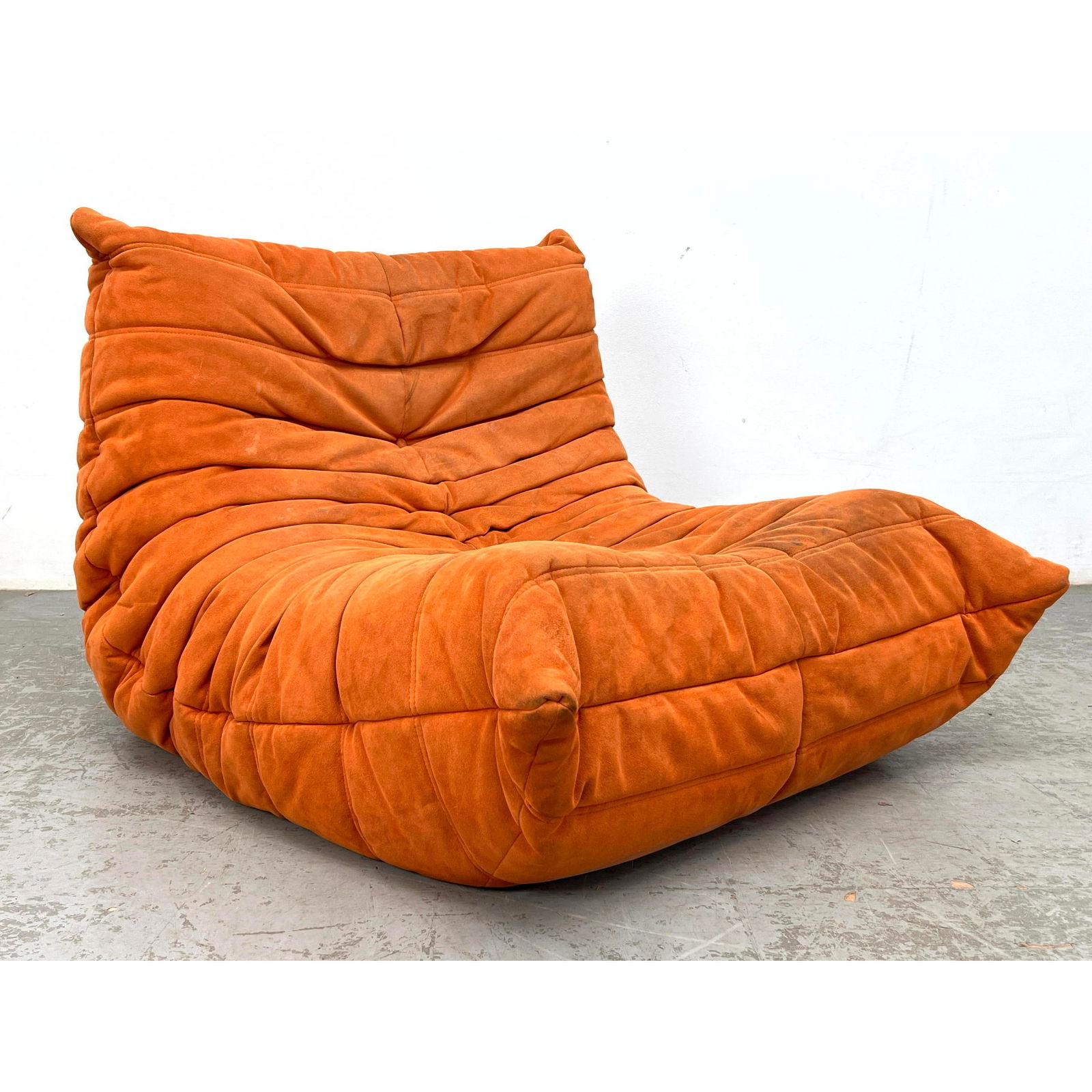 Ligne Roset TOGO Lounge Chair: Ligne Roset TOGO Lounge Chair Dimensions: Height: 28 inches, Width: 33 inches, Depth: 44 inches. --- - We offer curbside delivery for most items to NYC, Manhattan, Close Brooklyn, Hoboken about a week