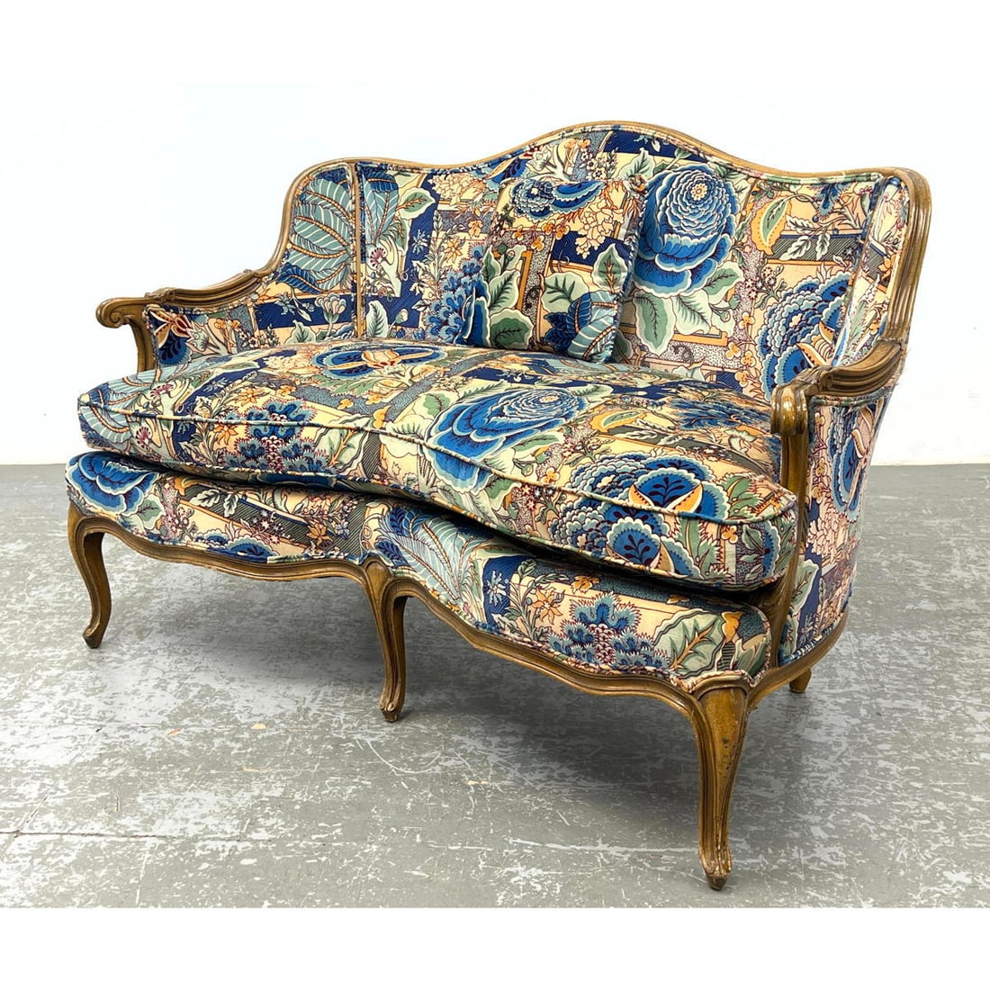 French style Love Seat Sofa.  Shaped Back on carved wood frame. Wonderful Floral Upholstery. (1 of 14)