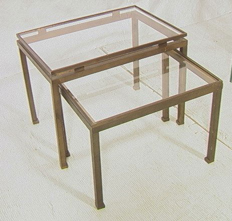 Set 2 GUY LEFEVRE Brass Nesting Tables. Tallest w: Set 2 GUY LEFEVRE Brass Nesting Tables. Tallest with raised glass top. Nice foot detail. Unmarked. Mastercraft style.-- Dimensions: H: 15 inches: W: 19.5 inches: D: 13.5 inches ---