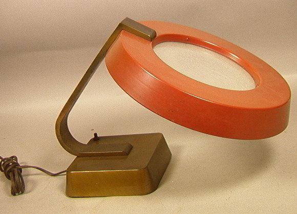 Modernist Lightolier Table Lamp. Enameled shade: Modernist Lightolier Table Lamp. Enameled shade and brass base. -- Dimensions: H: 12 inches: W: 14 inches: D: 21 inches ---